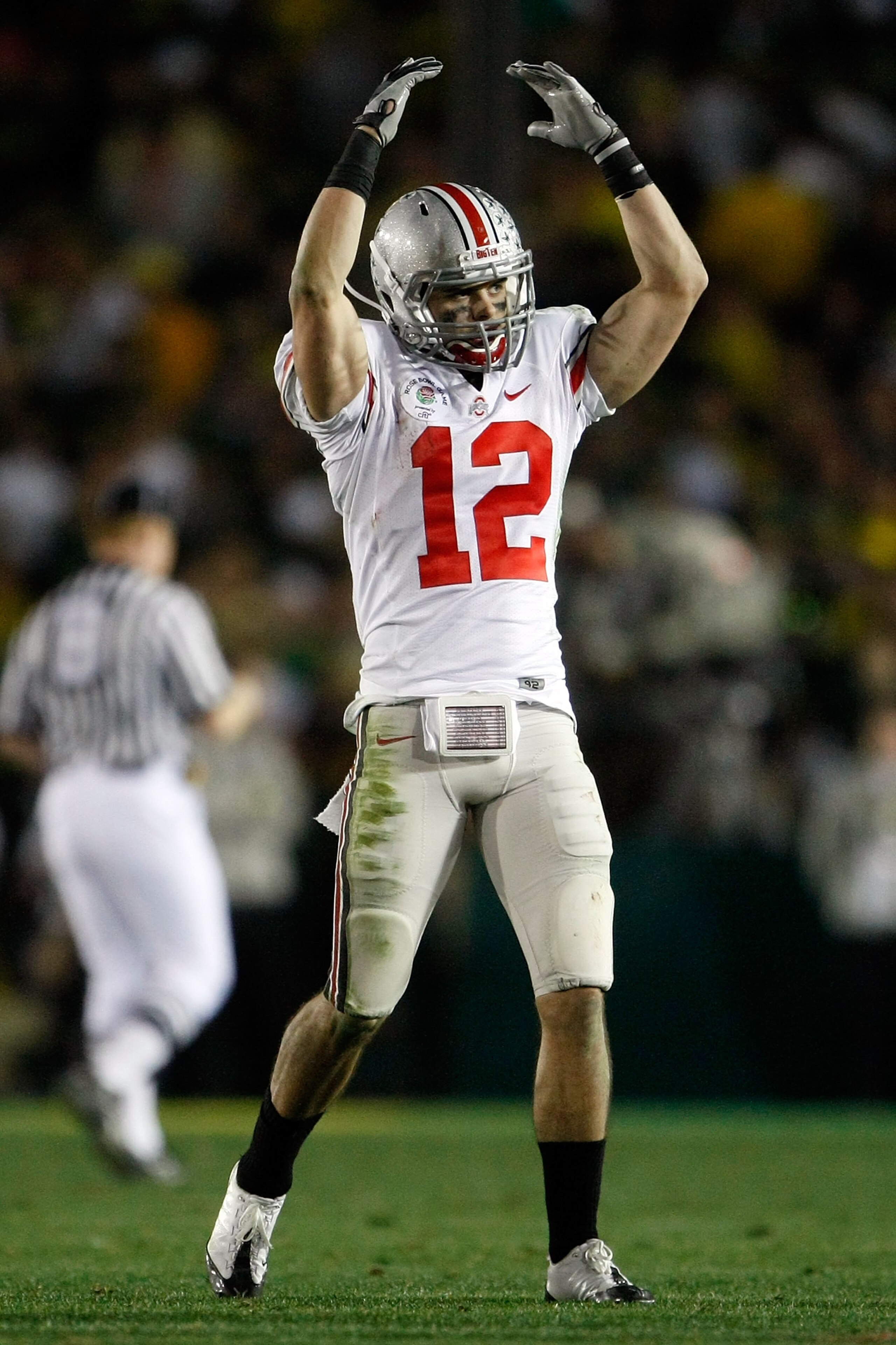 PASADENA, CA - JANUARY 01:  Dane Sanzenbacher #12 of the Ohio State Buckeyes reacts in the fourth quarter against the Oregon Ducks at the 96th Rose Bowl game on January 1, 2010 in Pasadena, California.  (Photo by Jeff Gross/Getty Images)