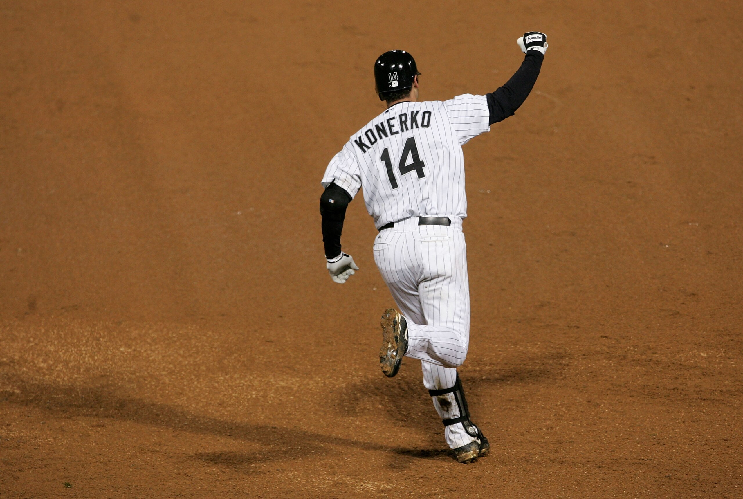 CHICAGO - OCTOBER 23:  Paul Konerko #14 of the Chicago White Sox celebrates after hitting a grandslam home run against the Houston Astros in the seventh inning during Game Two of the 2005 Major League Baseball World Series at U.S. Celluar Field on October