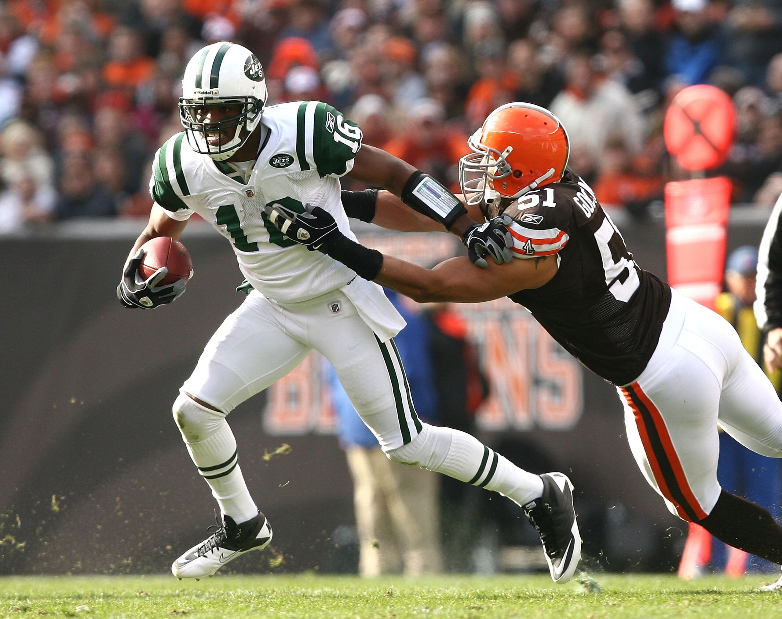 CLEVELAND - NOVEMBER 14:  Wide receiver Brad Smith #16 of the New York Jets runs the ball by linebacker Chris Gocong #51 of the Cleveland Browns at Cleveland Browns Stadium on November 14, 2010 in Cleveland, Ohio.  (Photo by Matt Sullivan/Getty Images)
