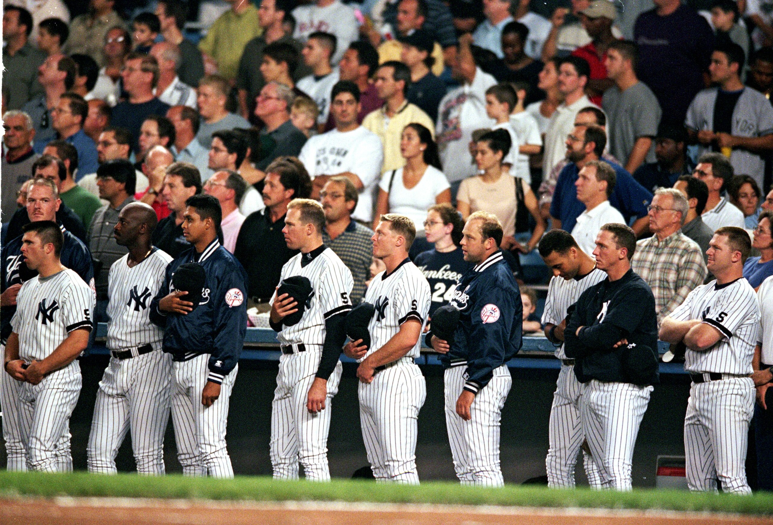 10 Sep 1999:  The New York Yankees take a moment of silence for the passing of Jim 'Catfish' Hunter before the game against the Boston Red Sox at Yankee Stadium in Bronx, New York. The Red Sox defeated the Yankees 4-1. Mandatory Credit: Ezra O. Shaw  /All