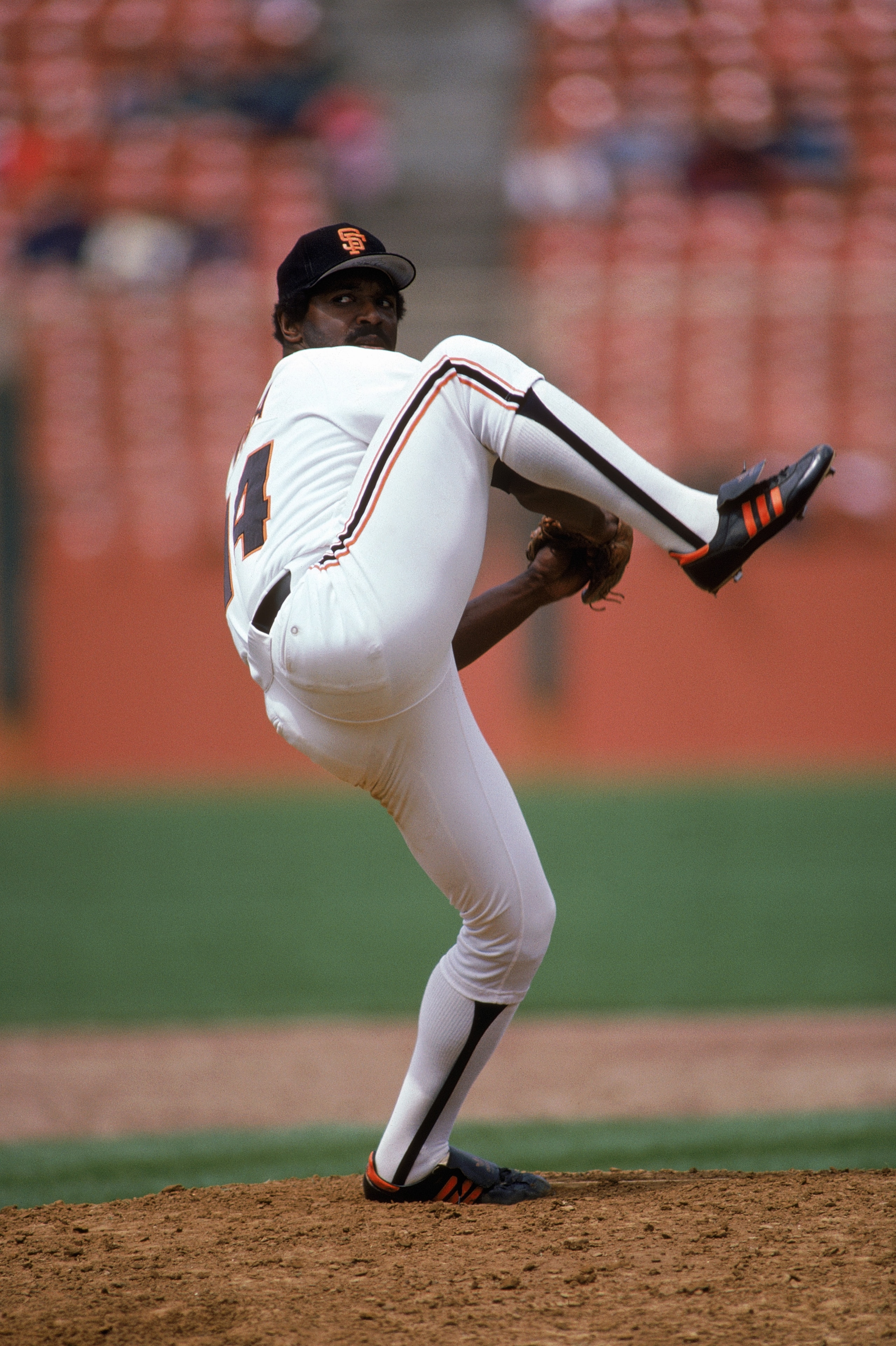 SAN FRANCISCO - MAY 11:  Vida Blue #14 of the San Francisco Giants winds up a pitch during a game against the St. Louis Cardinals at Candlestick Park on May 11, 1985 in San Francisco, California. (Photo by Otto Greule Jr/Getty Images)