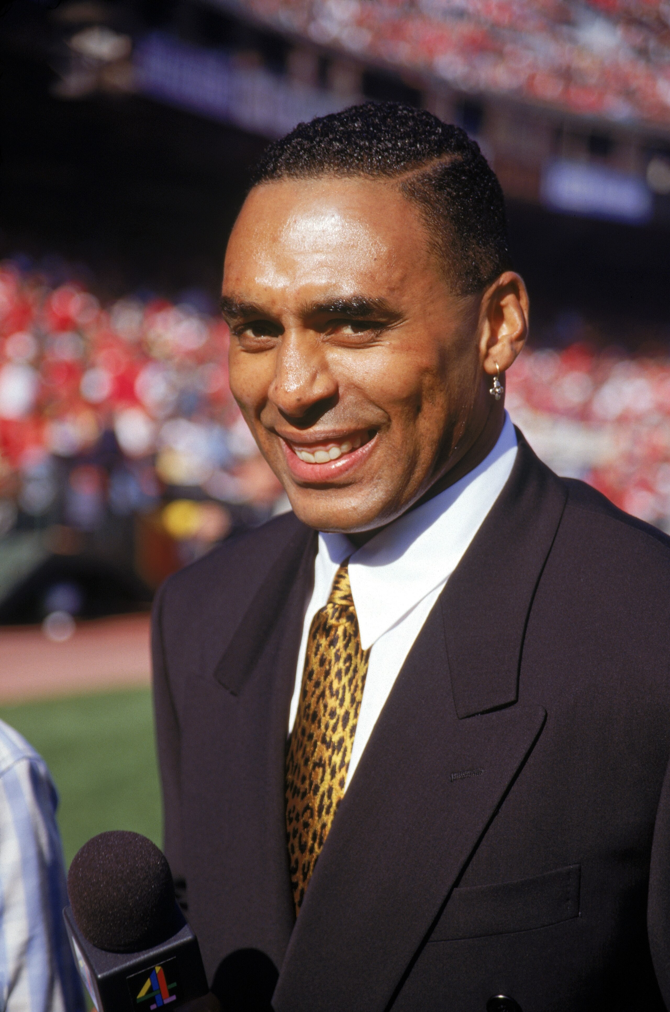 SAN FRANCISCO - JANUARY 6:  Newscaster Roger Craig looks on during the 1995 NFC Divisional Playoffs game with the Green Bay Packers against the San Francisco 49ers at Candlestick Park on January 6, 1996 in San Francisco, California. The Packers won 27-17.
