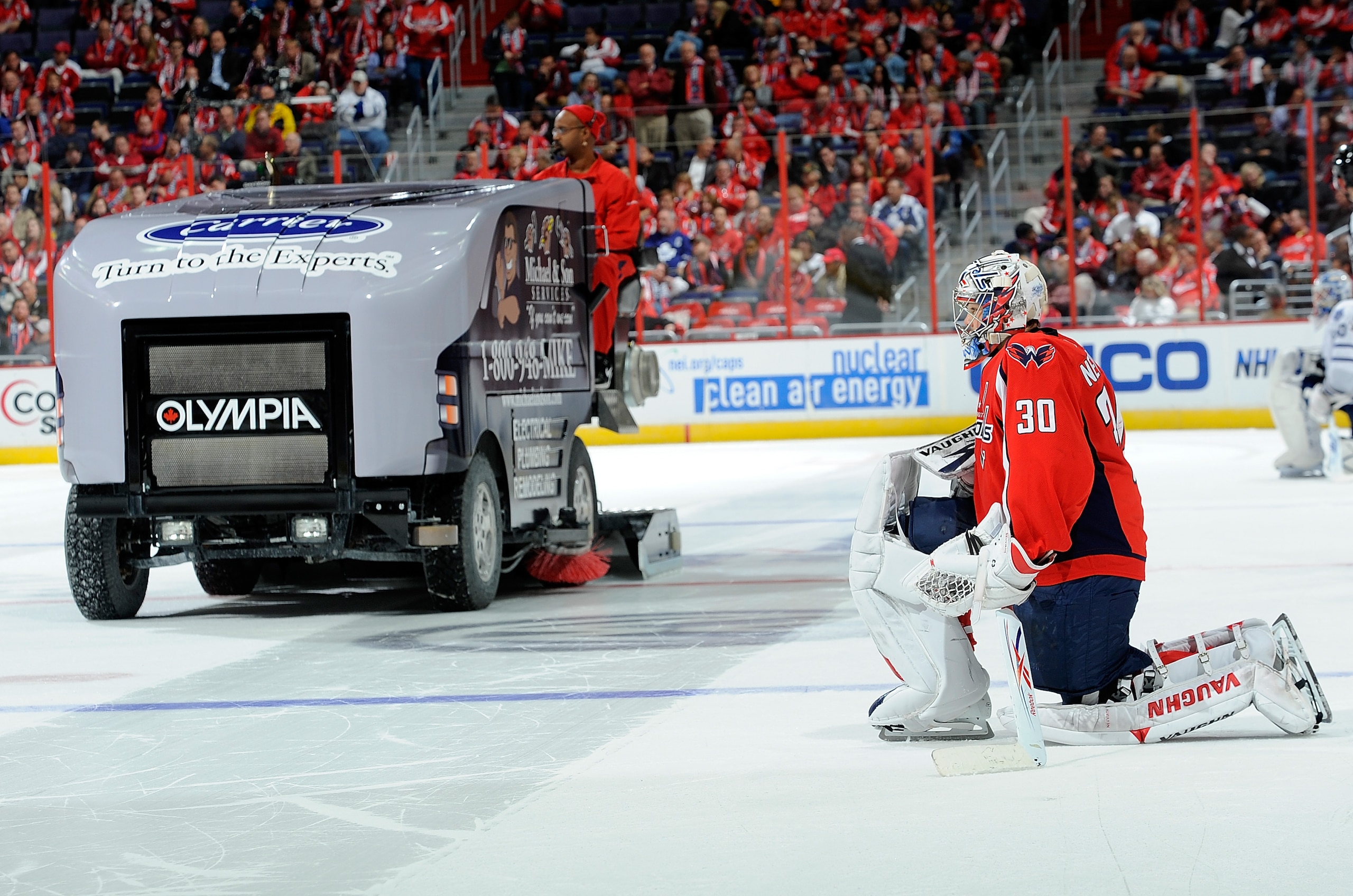 WASHINGTON - NOVEMBER 03:  Michal Neuvirth #30 of the Washington Capitals waits as the Olympia ice machine resurfaces the ice before the shootout against the Toronto Maple Leafs at the Verizon Center on November 3, 2010 in Washington, DC.  (Photo by Greg