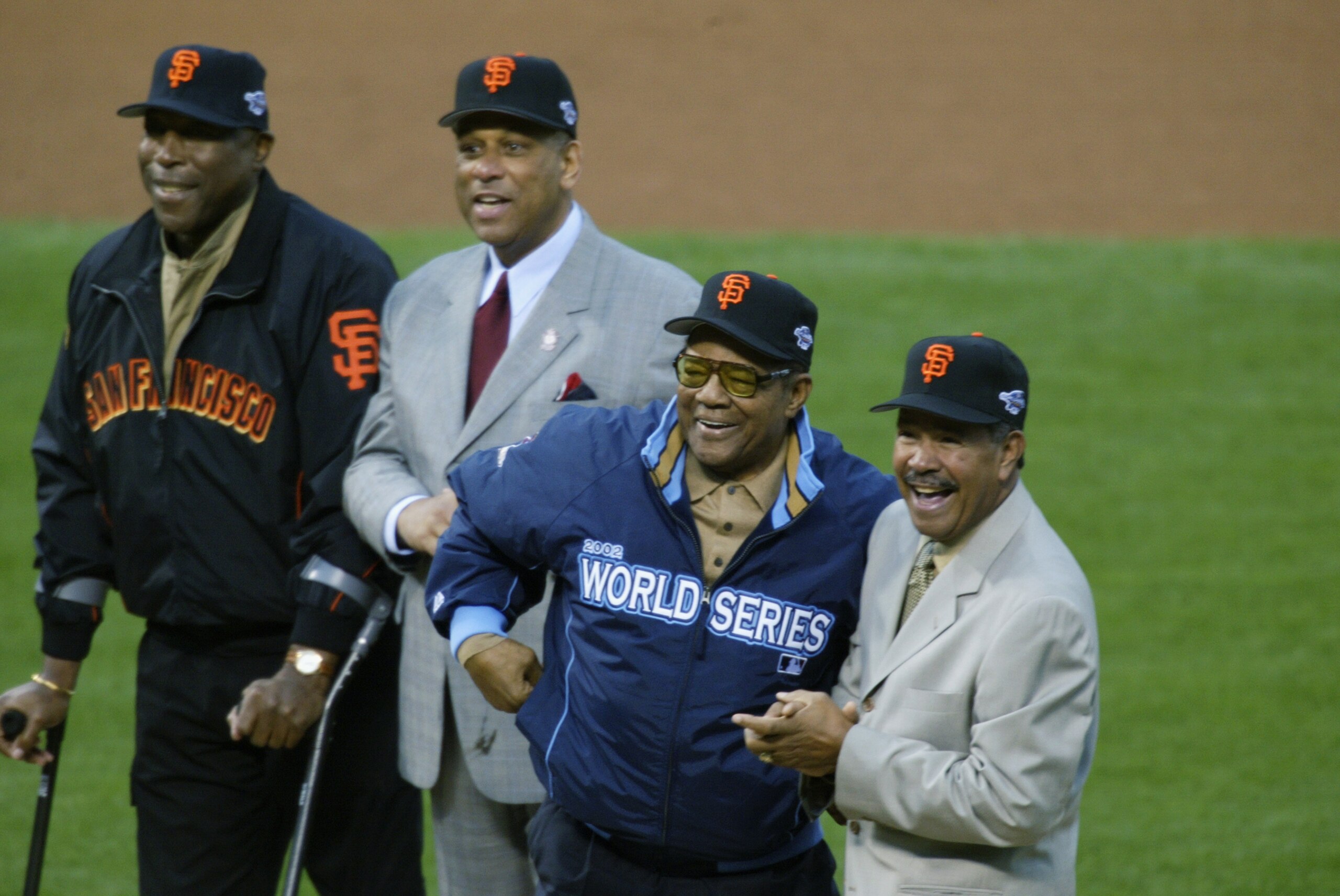 SAN FRANCISCO - OCTOBER 22:  (L-R) Old time Giants Willie McCovey, Orlando Cepeda, Willie Mays and Juan Marichal smile from the mound before throwing out the ceremonial first pitch prior to the start of game three between the Anaheim Angels and the San Fr