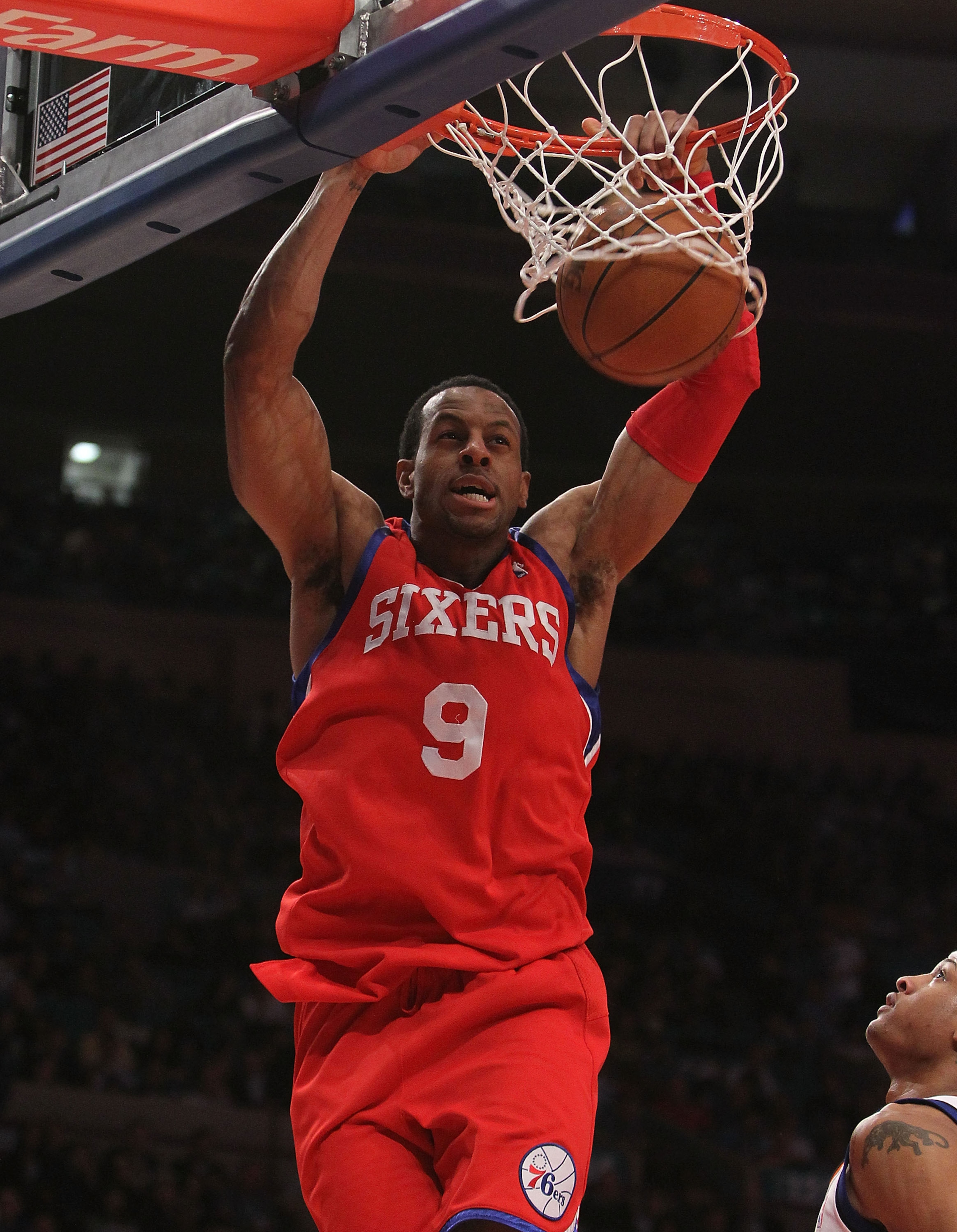NEW YORK - MARCH 19:  Andre Iguodala #8 of the Philadelphia 76ers dunks the ball against the New York Knicks at Madison Square Garden on March 19, 2010 in New York City. NOTE TO USER: User expressly acknowledges and agrees that, by downloading and or usin