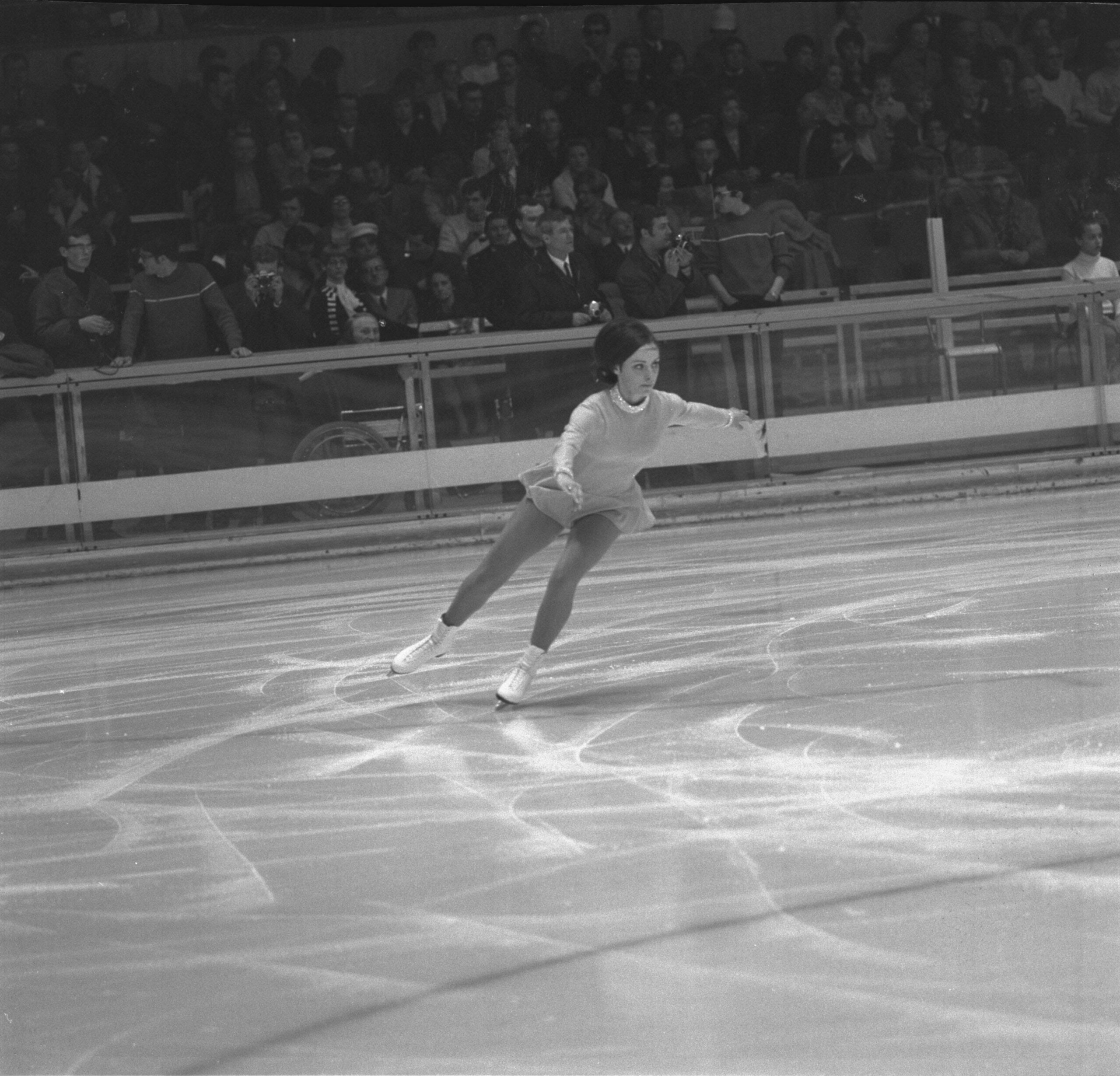 11 Feb 1968:   Peggy Fleming of the USA in action during her routine in the Women's Figure Skating event at the 1968 Winter Olympic Games in Grenoble, France. Fleming won the gold medal in this event.  (Photo by IOC Olympic Museum/Getty Images)