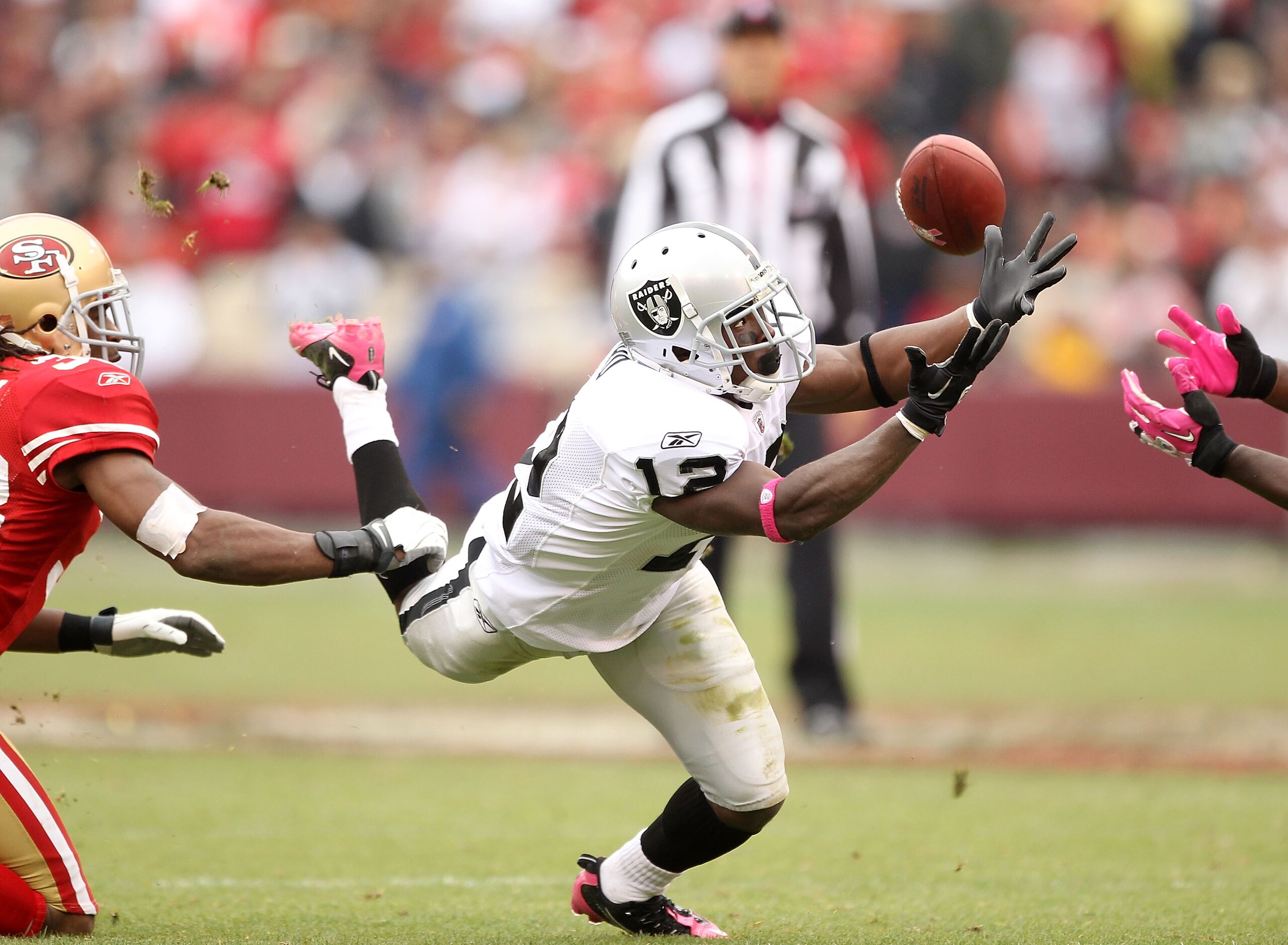 SAN FRANCISCO - OCTOBER 17:  Jacoby Ford #12 of the Oakland Raiders in action against the San Francisco 49ers at Candlestick Park on October 17, 2010 in San Francisco, California.  (Photo by Ezra Shaw/Getty Images)