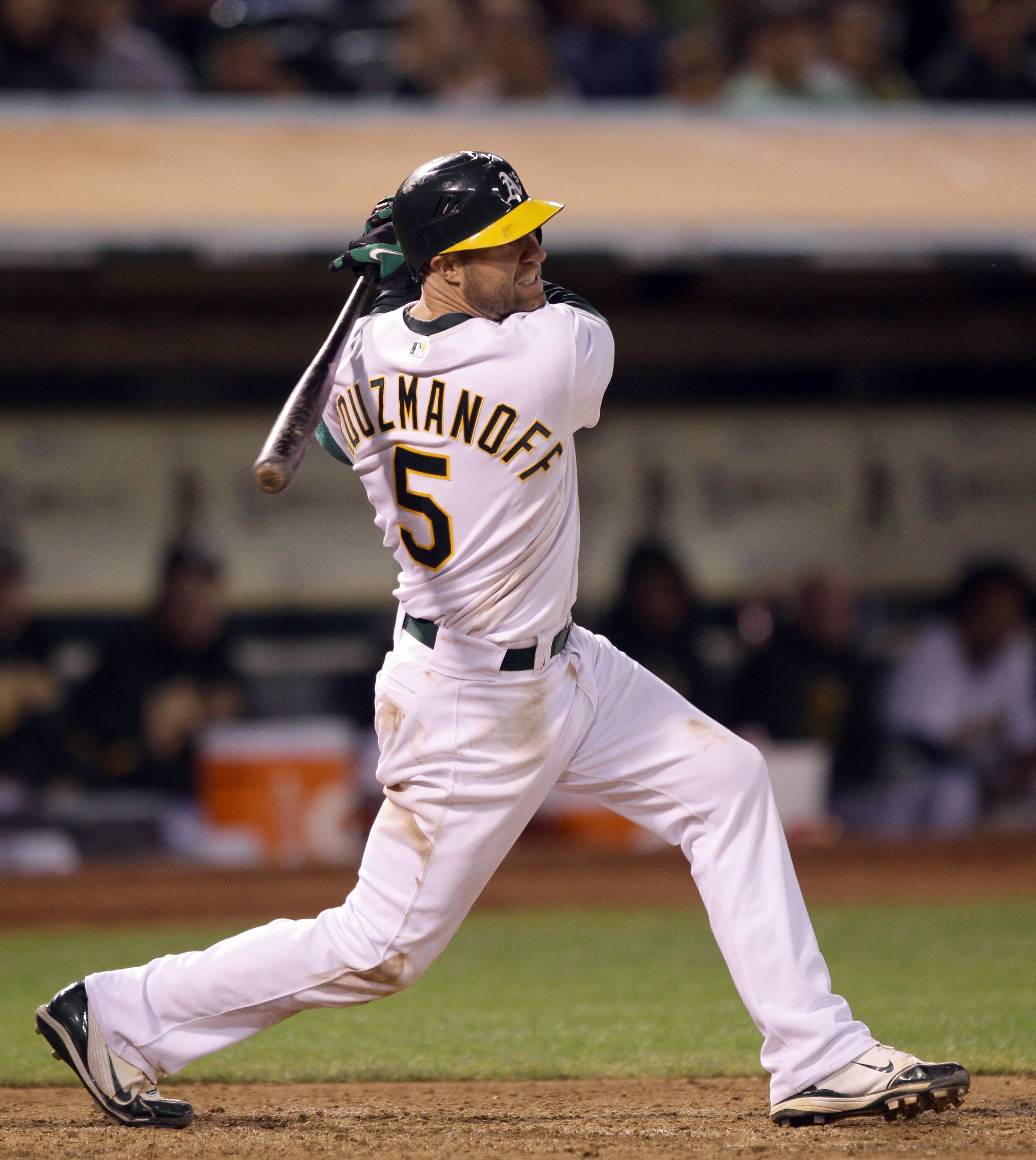 OAKLAND, CA - AUGUST 20:  Kevin Kouzmanoff #5 of the Oakland Athletics bats against the Tampa Bay Rays at the Oakland-Alameda County Coliseum  on August 20, 2010 in Oakland, California.  (Photo by Ezra Shaw/Getty Images)