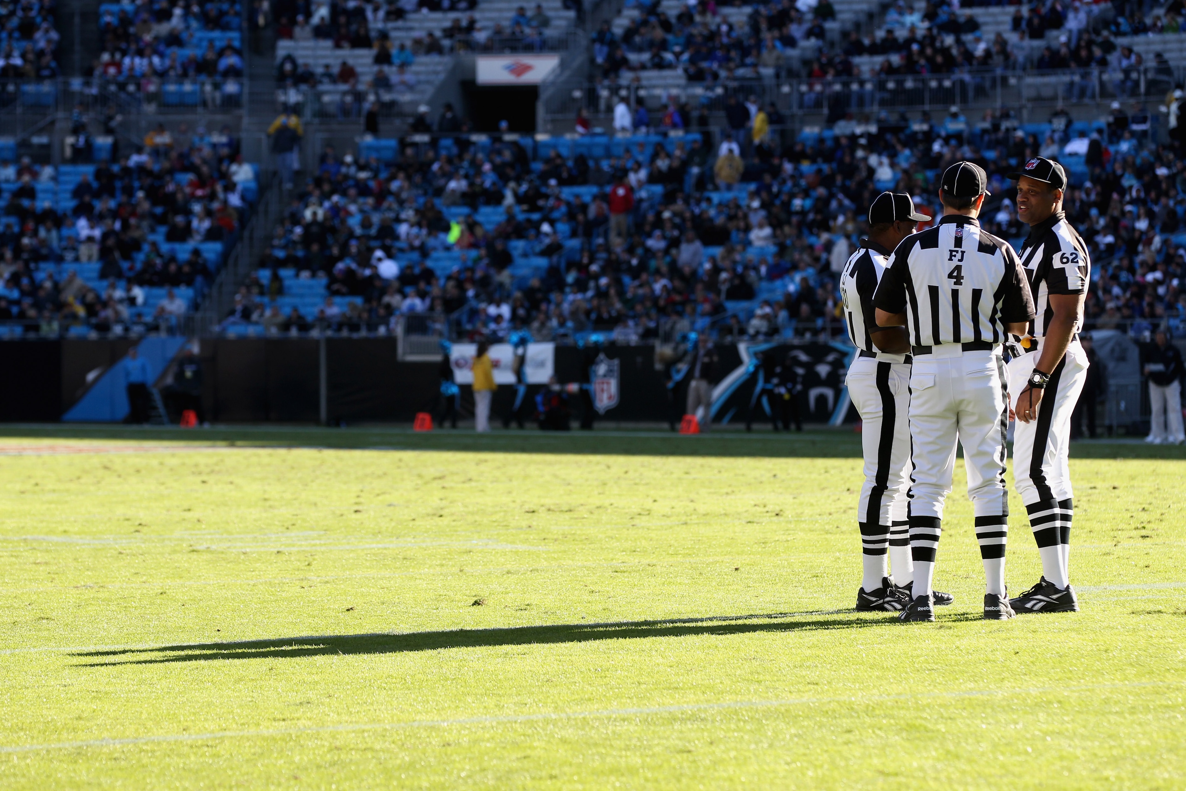 CHARLOTTE, NC - NOVEMBER 07: A group of referees huddle during their game between the New Orleans Saints and the Carolina Panthers during their game at Bank of America Stadium on November 7, 2010 in Charlotte, North Carolina. (Photo by Streeter Lecka/Ge CHARLOTTE, NC - NOVEMBER 07: A group of referees huddle during their game between the New Orleans Saints and the Carolina Panthers during their game at Bank of America Stadium on November 7, 2010 in Charlotte, North Carolina. (Photo by Streeter Lecka/Ge