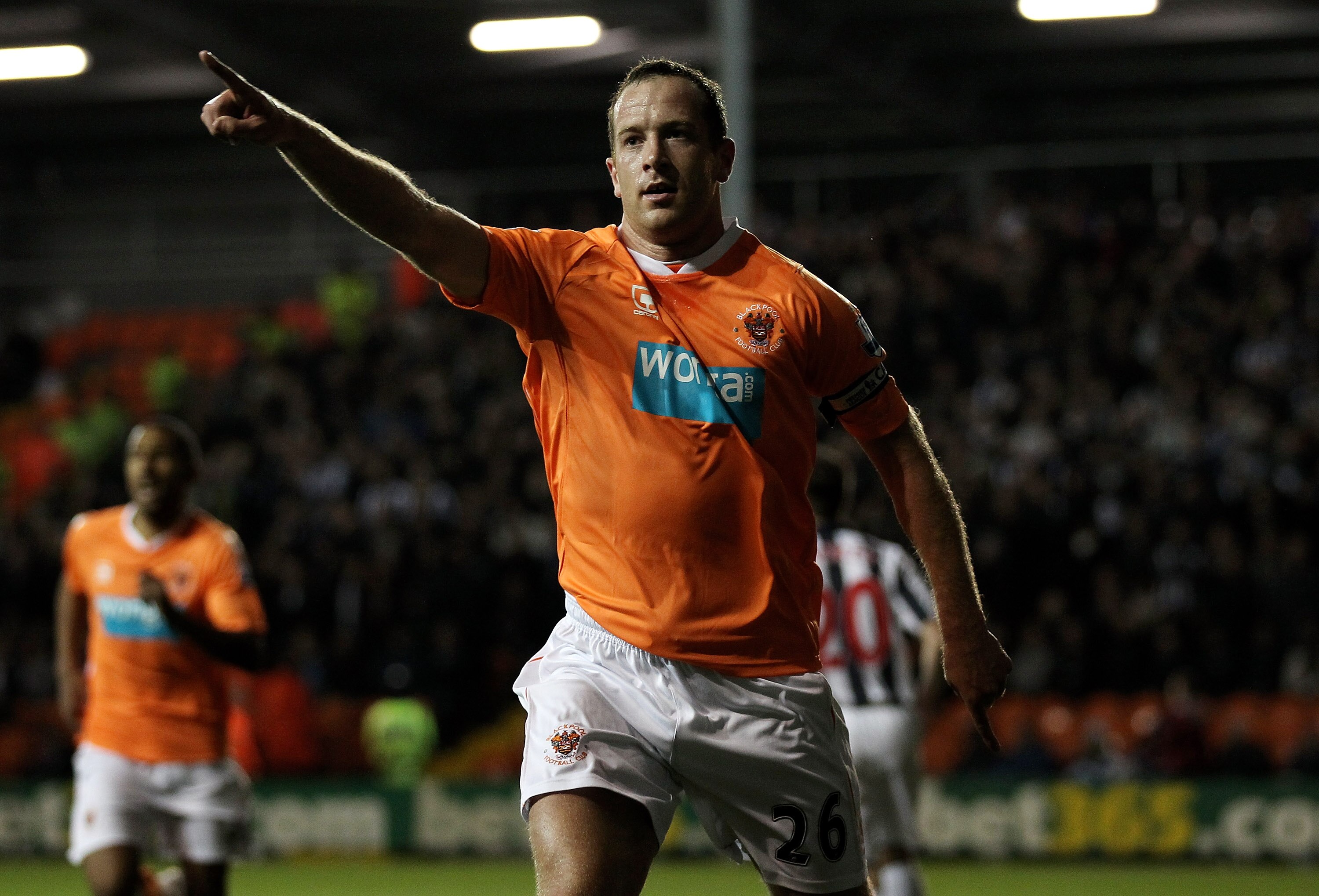 BLACKPOOL, ENGLAND - NOVEMBER 01:   Charlie Adam of Blackpool celebrates scoring the opening goal from a penalty during the Barclays Premier League match between Blackpool and West Bromwich Albion at Bloomfield Road on November 1, 2010 in Blackpool, Engla