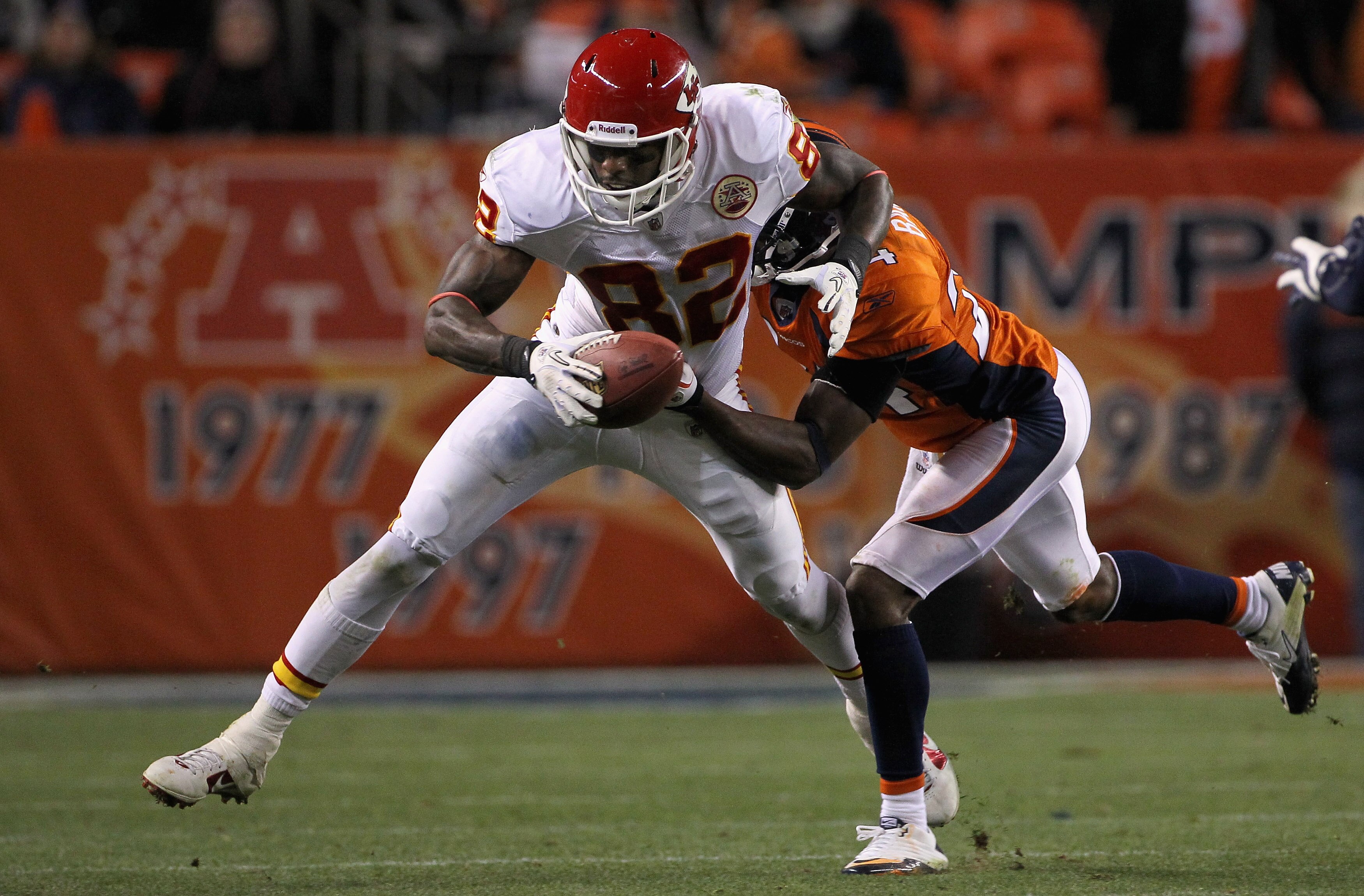 DENVER - NOVEMBER 14:  Wide receiver Dwayne Bowe #82 of the Kansas City Chiefs makes a reception as Champ Bailey #24 of the Denver Bronco defends at INVESCO Field at Mile High on November 14, 2010 in Denver, Colorado. The Broncos defeated the Cheifs 49-29