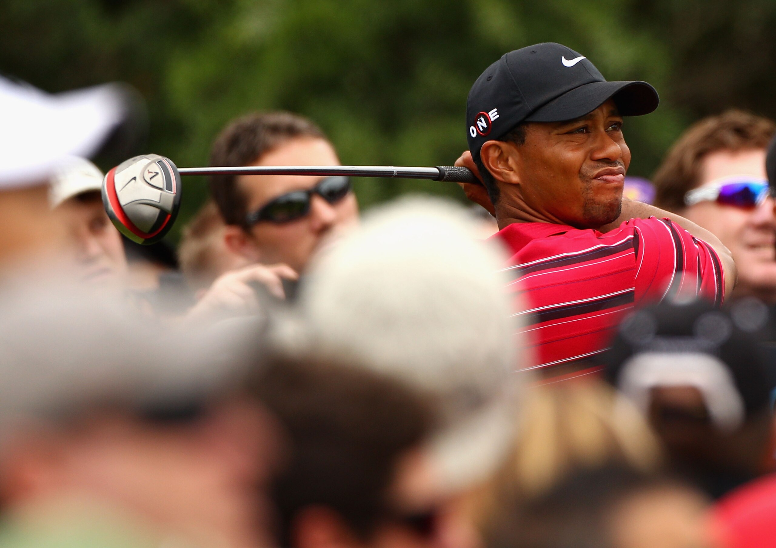 MELBOURNE, AUSTRALIA - NOVEMBER 14:  Tiger Woods of the USA hits a tee shot during round four of the Australian Masters at The Victoria Golf Club on November 14, 2010 in Melbourne, Australia.  (Photo by Ryan Pierse/Getty Images)