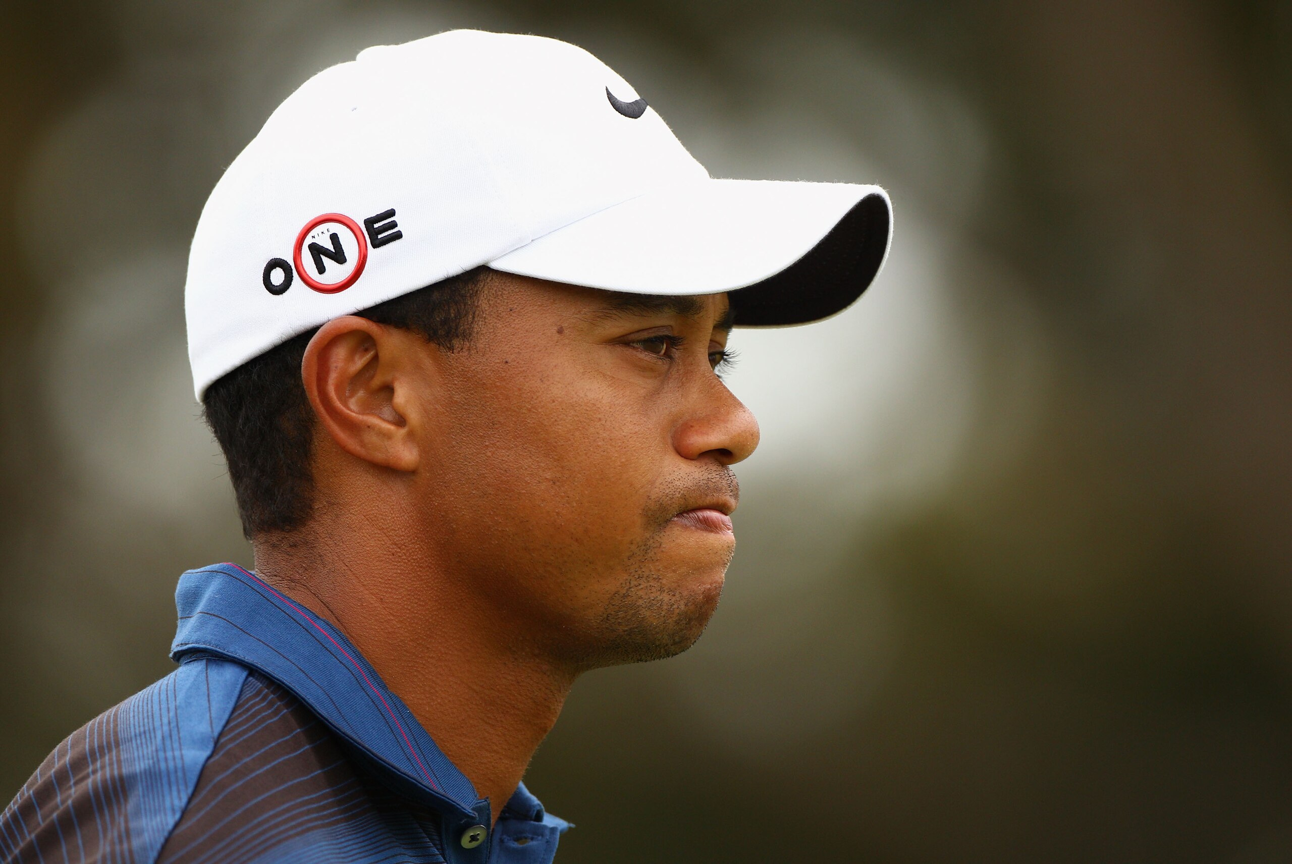 MELBOURNE, AUSTRALIA - NOVEMBER 12:  Tiger Woods of the USA looks dejected after missing a putt during day two of the Australian Masters at The Victoria Golf Club on November 12, 2010 in Melbourne, Australia.  (Photo by Ryan Pierse/Getty Images)