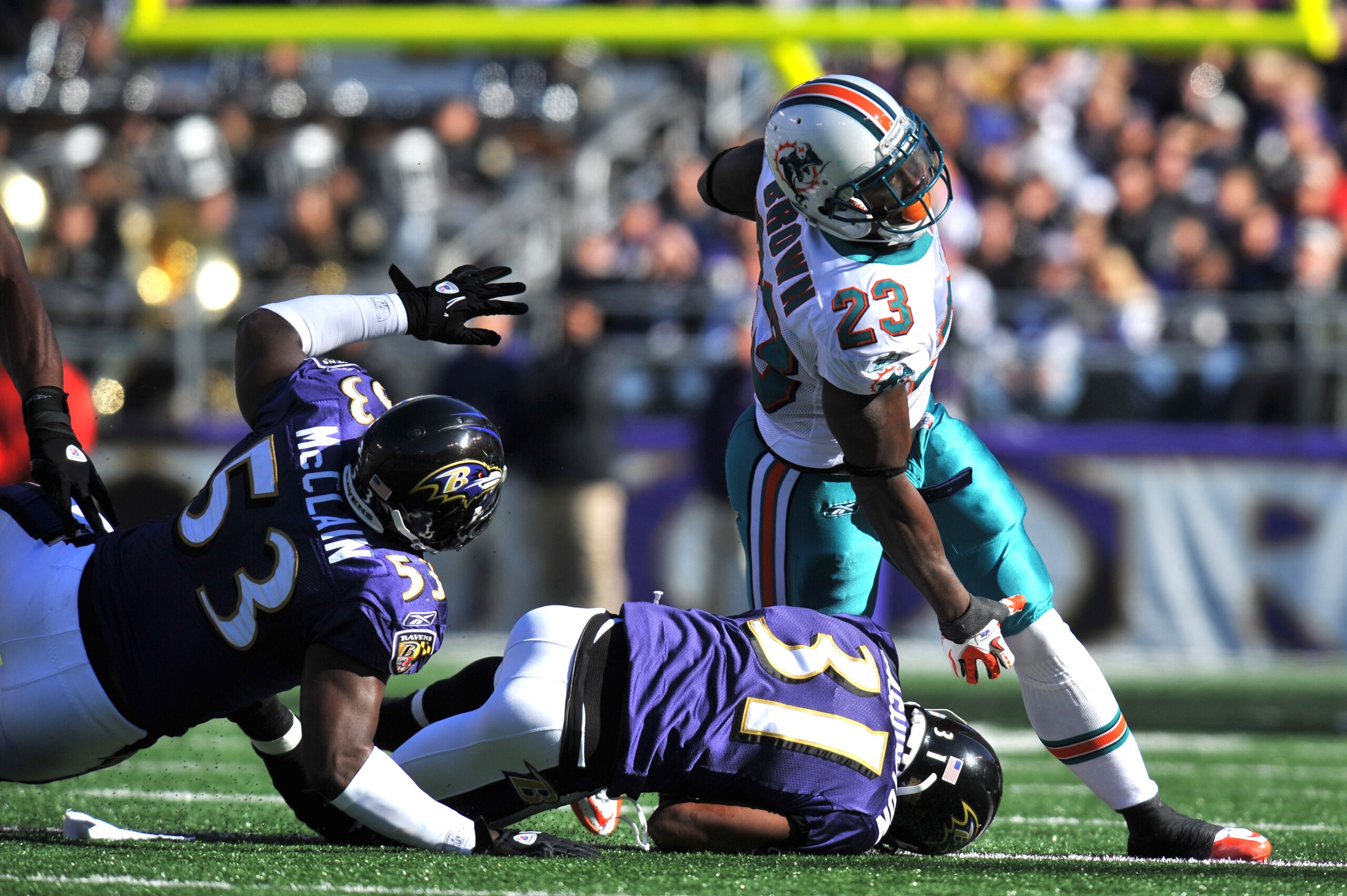 BALTIMORE, MD - NOVEMBER 7:  Ronnie Brown #23 of the Miami Dolphins runs the ball against the Baltimore Ravens at M&T Bank Stadium on November 7, 2010 in Baltimore, Maryland. The Ravens defeated the Dolphins 26-10. (Photo by Larry French/Getty Images)