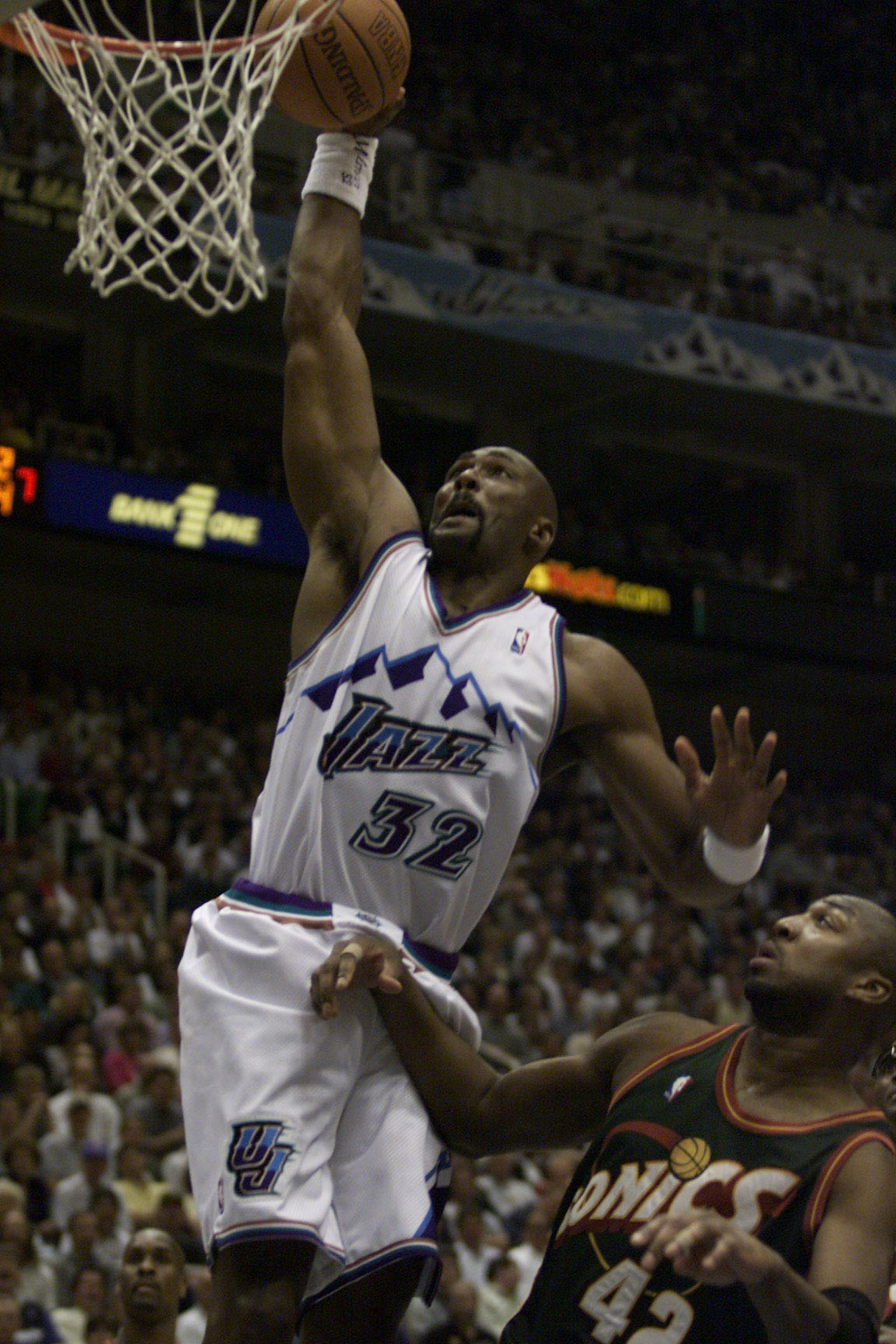 24 Apr 2000:   Karl Malone #32 of the Utah Jazz dunks on Vin Baker #42 of the Seattle Sonics during game 2 of the Western Conference NBA Playoffs at the Delta Center in Salt Lake City, Utah. DIGITAL IMAGE. Mandatory Credit: Jed Jacobsohn/ALLSPORT