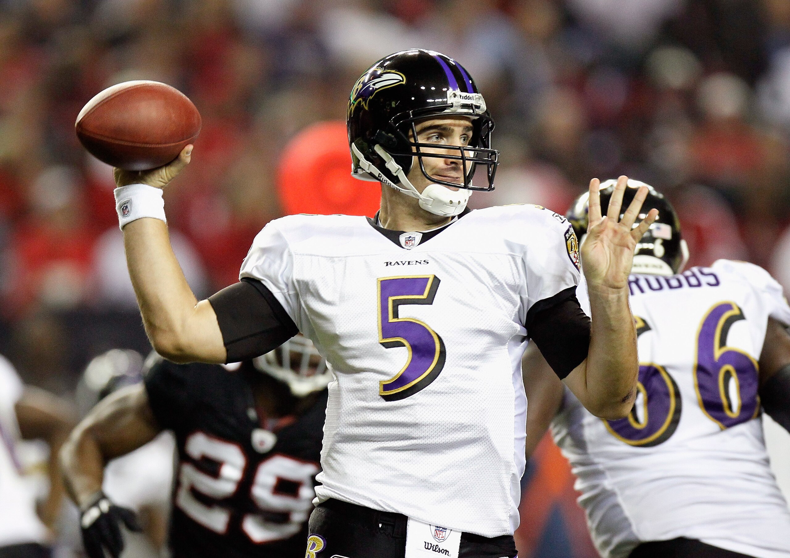ATLANTA - NOVEMBER 11:  Quarterback Joe Flacco #5 of the Baltimore Ravens looks to pass against the Atlanta Falcons at Georgia Dome on November 11, 2010 in Atlanta, Georgia.  (Photo by Kevin C. Cox/Getty Images)