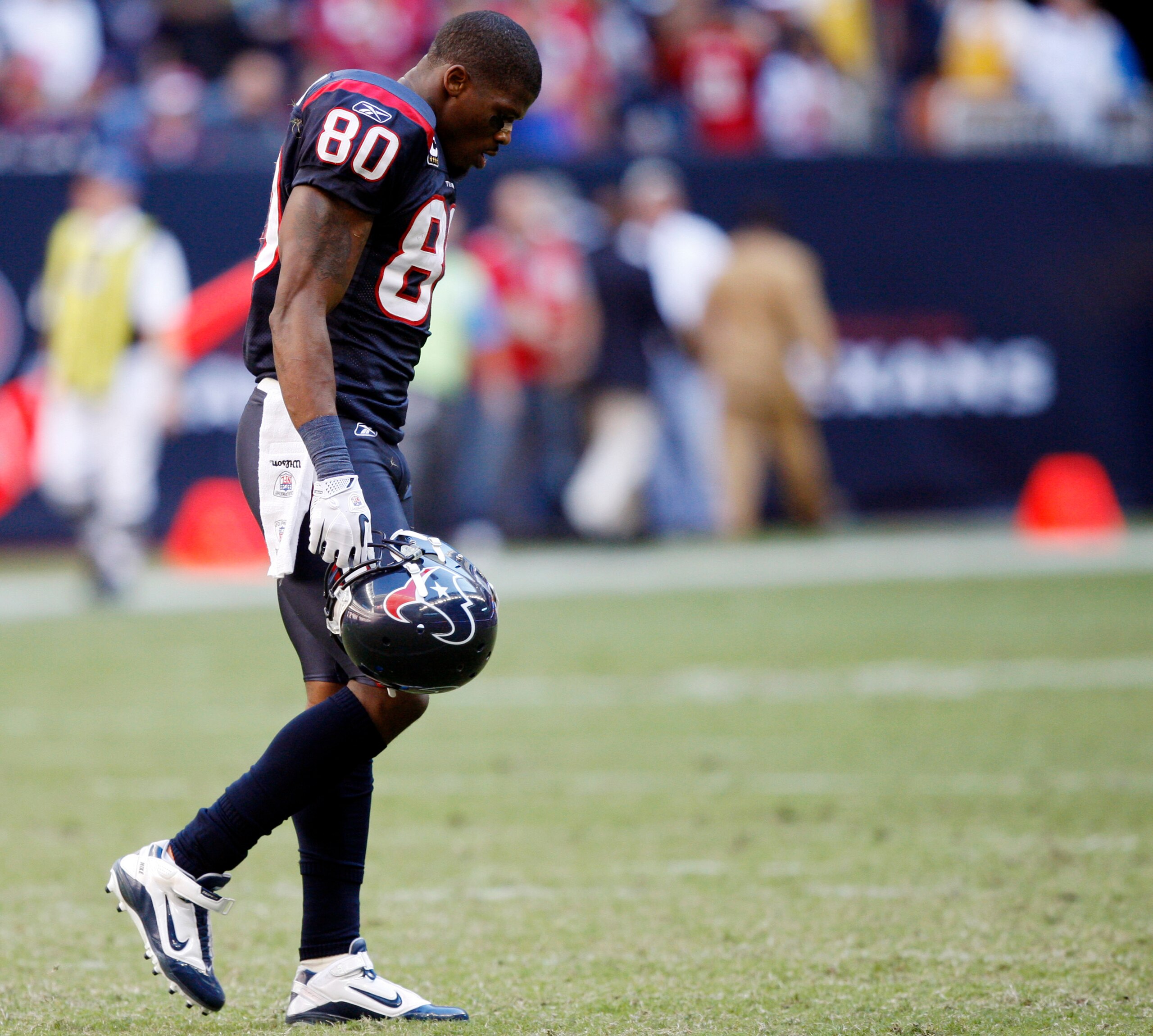 HOUSTON - NOVEMBER 07:  Wide receiver Andre Johnson #80 walks off the field after losing control of a pass that was intercepted by San Diego Charger Paul Oliver at Reliant Stadium on November 7, 2010 in Houston, Texas.  (Photo by Bob Levey/Getty Images)