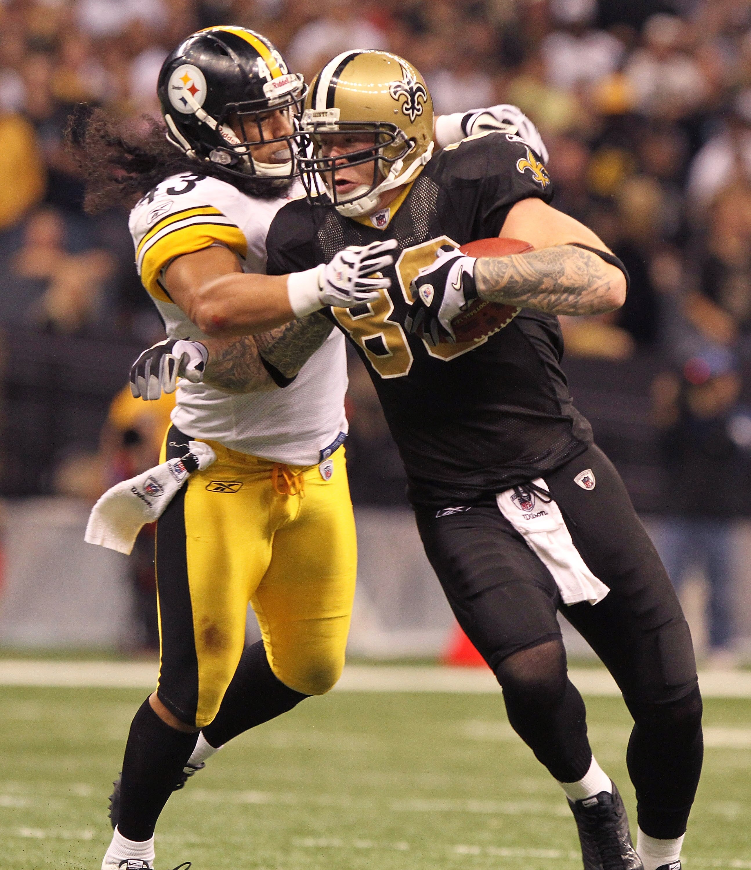 NEW ORLEANS - OCTOBER 31: Jeremy Shockey #88 of the New Orleans Saints is tackled by Troy Polamalu #43 of the Pittsburgh Steelers at the Louisiana Superdome on October 31, 2010 in New Orleans, Louisiana. (Photo by Matthew Sharpe/Getty Images)