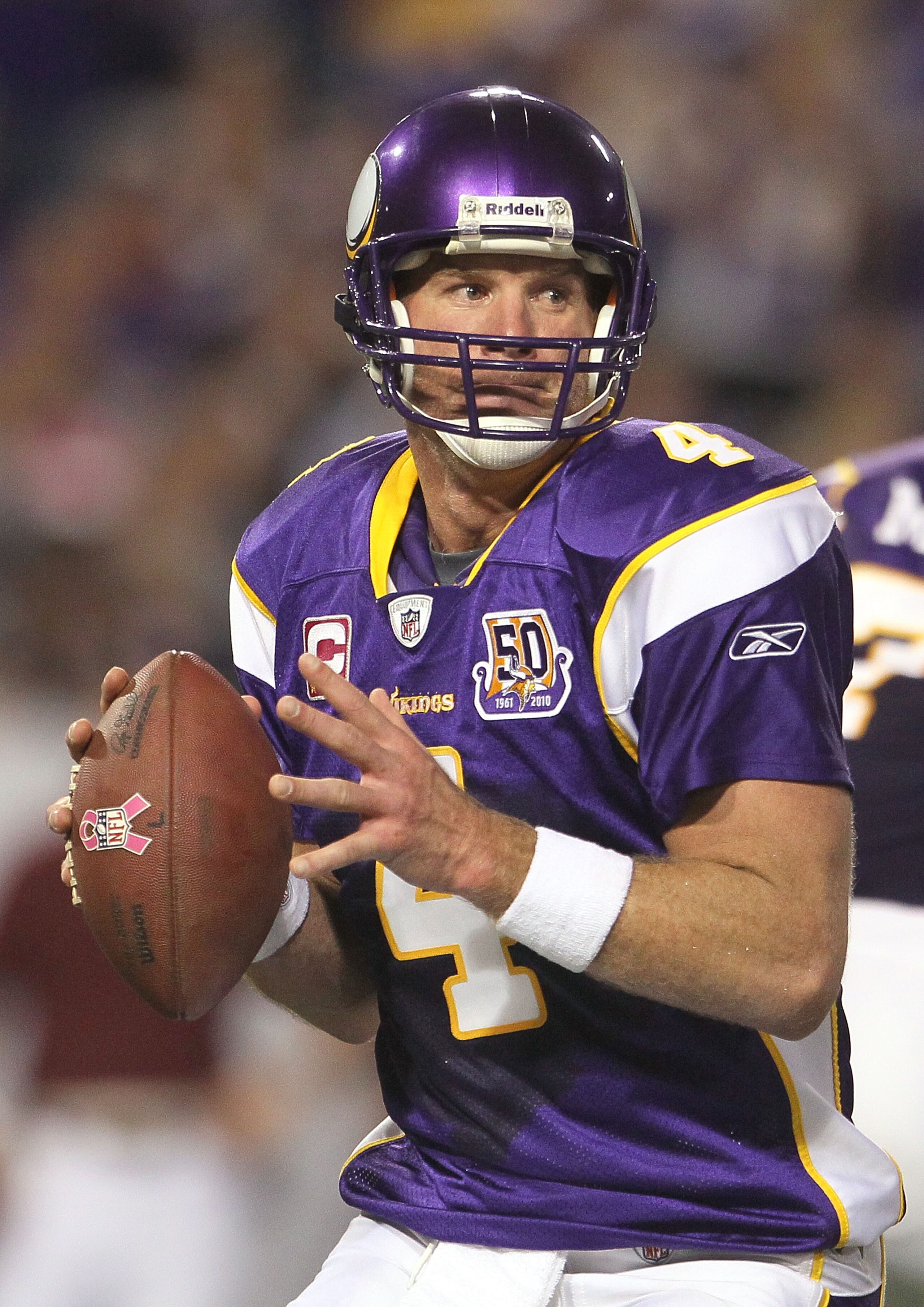 MINNEAPOLIS - OCTOBER 17:  Quarterback Brett Favre #4 of the Minnesota Vikings drops back to pass during the fourth quarter against the Dallas Cowboys at Mall of America Field on October 17, 2010 in Minneapolis, Minnesota. The Vikings defeated the Cowboys