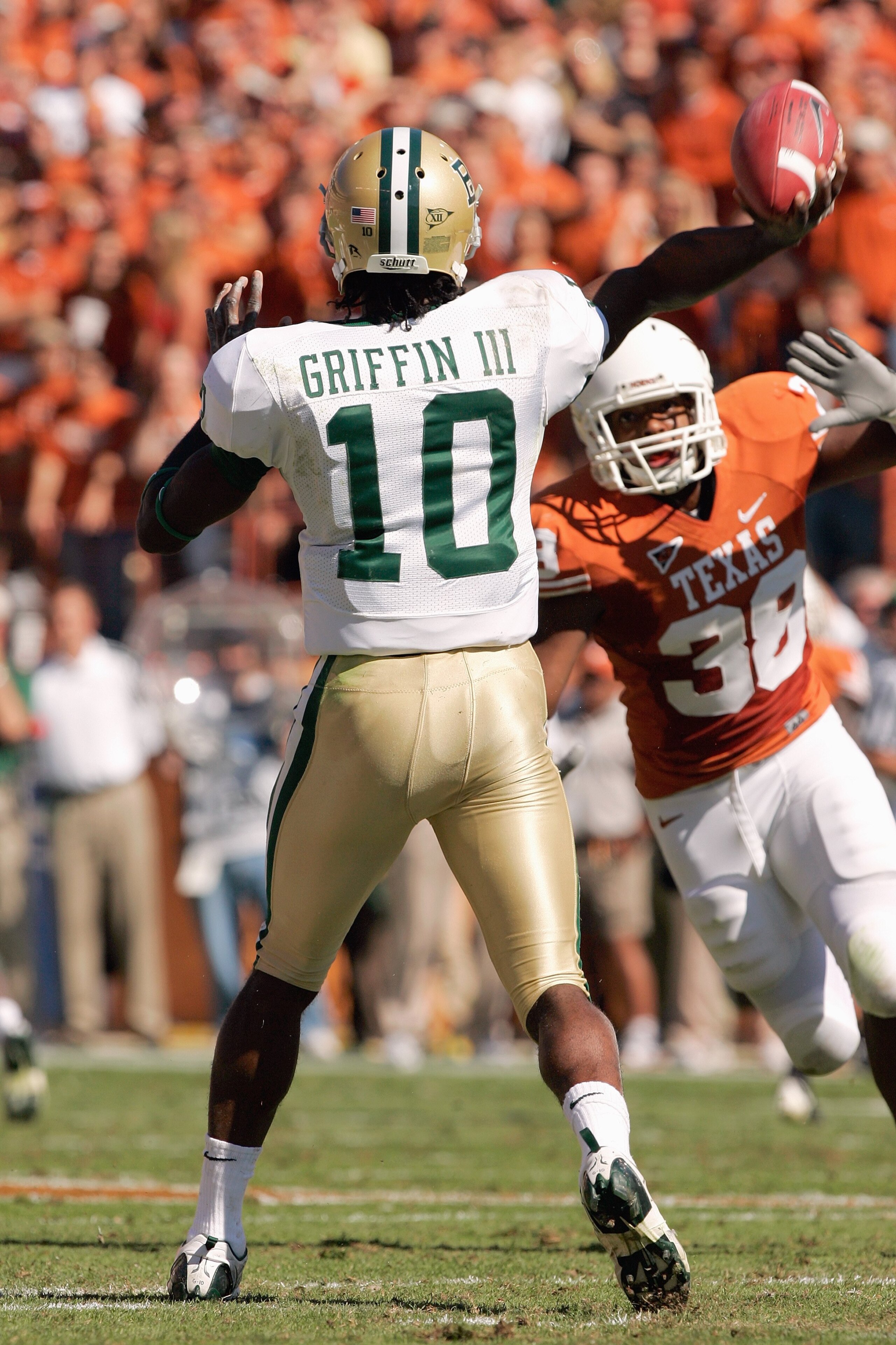AUSTIN, TX - NOVEMBER 8: Quarterback Robert Griffin #10 of the Baylor Bears passes the bal downfield during the game against the Texas Longhorns on November 8, 2008 at Darrell K Royal-Texas Memorial Stadium in Austin, Texas. Texas won 45-21. (Photo by B AUSTIN, TX - NOVEMBER 8: Quarterback Robert Griffin #10 of the Baylor Bears passes the bal downfield during the game against the Texas Longhorns on November 8, 2008 at Darrell K Royal-Texas Memorial Stadium in Austin, Texas. Texas won 45-21. (Photo by B