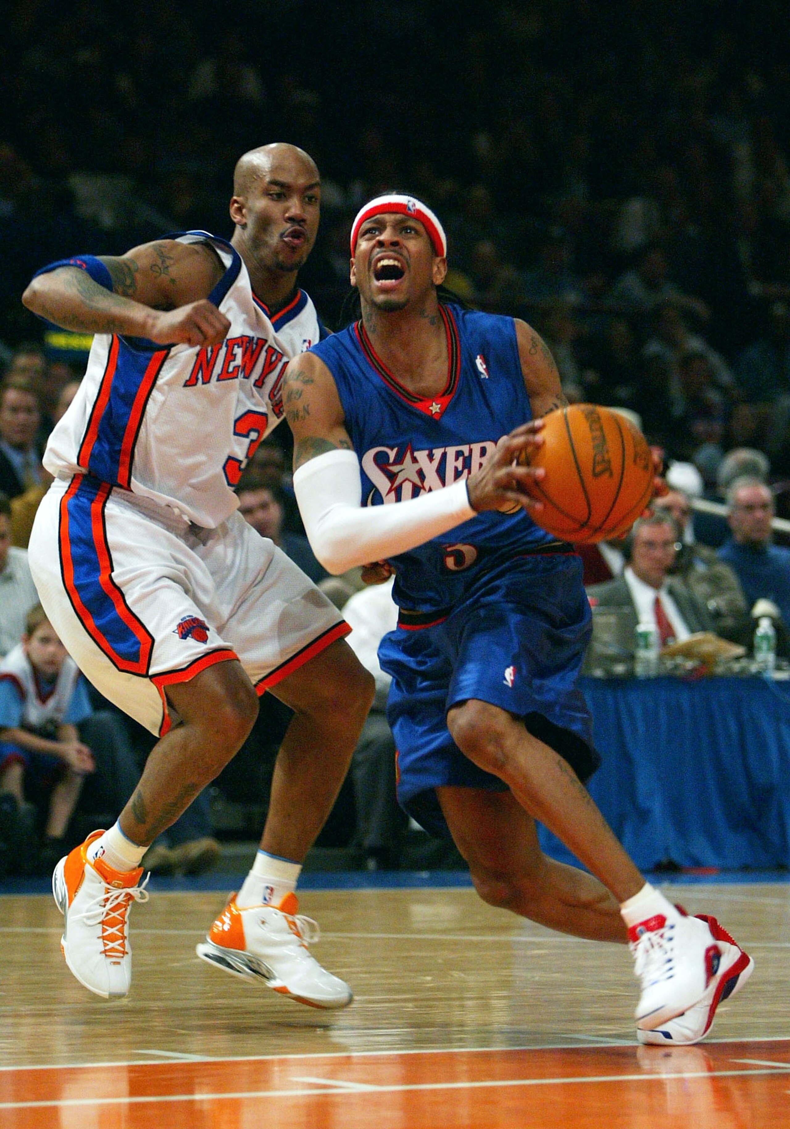 NEW YORK CITY - MARCH 3:  Allen Iverson #3 of the Philadelphia 76ers drives to the basket against Stephon Marbury #3 of the New York Knicks March 3, 2004 at Madison Square Garden in New York City, New York. NOTE TO USER: User expressly acknowledges and ag