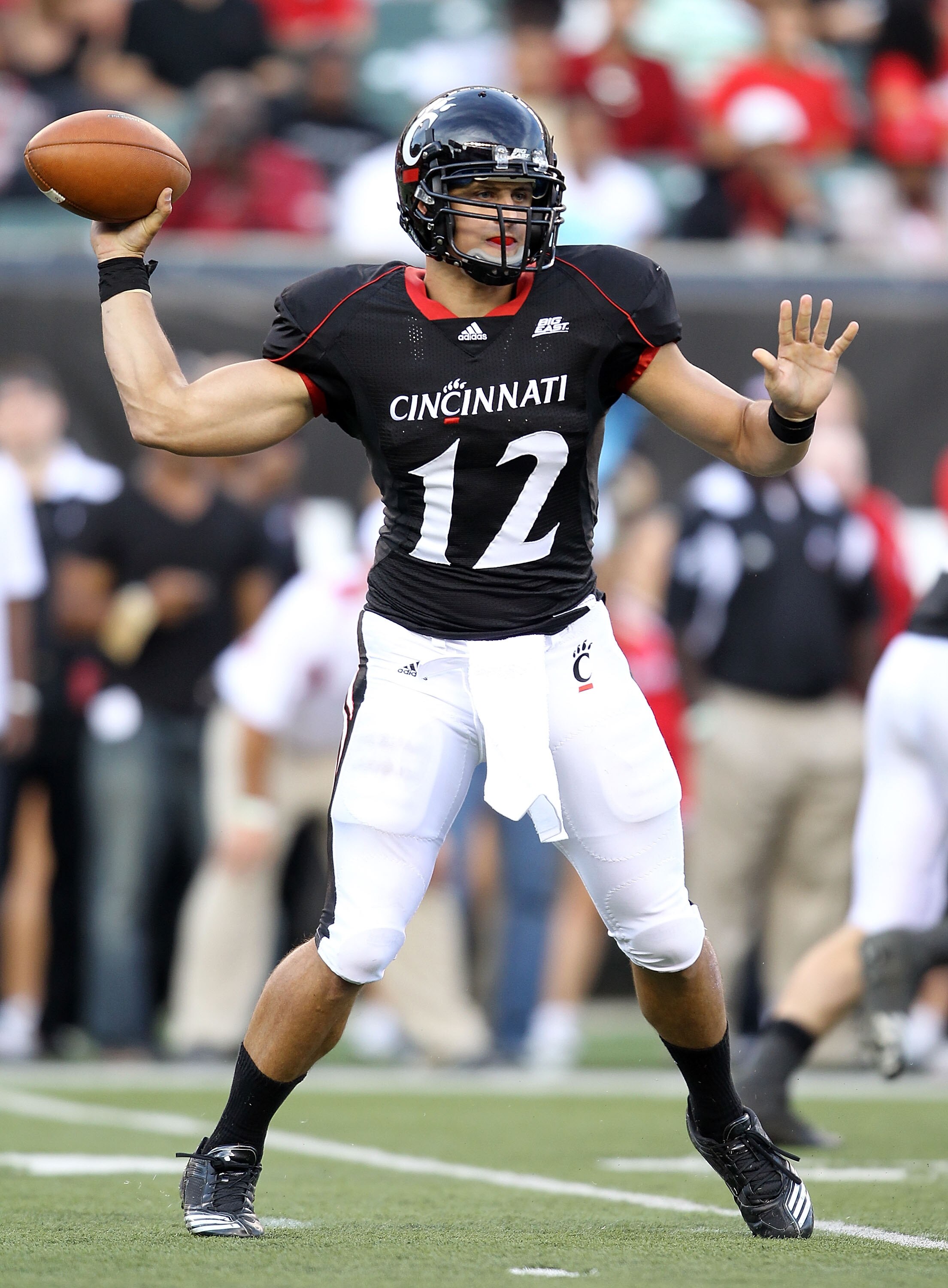 CINCINNATI - SEPTEMBER 25:  Zach Collaros #12 of  the Cincinnati Bearcats throws a pass during the game against the Oklahoma Sooners at Paul Brown Stadium on September 25, 2010 in Cincinnati, Ohio.  (Photo by Andy Lyons/Getty Images)
