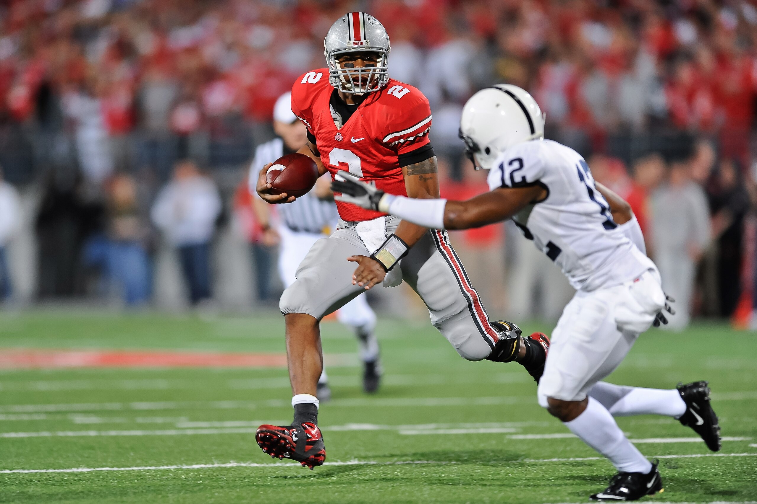 COLUMBUS, OH - NOVEMBER 13: Quarterback Terrelle Pryor #2 of the Ohio State Buckeyes runs with the ball against the Penn State Nittany Lions at Ohio Stadium on November 13, 2010 in Columbus, Ohio. (Photo by Jamie Sabau/Getty Images) COLUMBUS, OH - NOVEMBER 13: Quarterback Terrelle Pryor #2 of the Ohio State Buckeyes runs with the ball against the Penn State Nittany Lions at Ohio Stadium on November 13, 2010 in Columbus, Ohio. (Photo by Jamie Sabau/Getty Images)