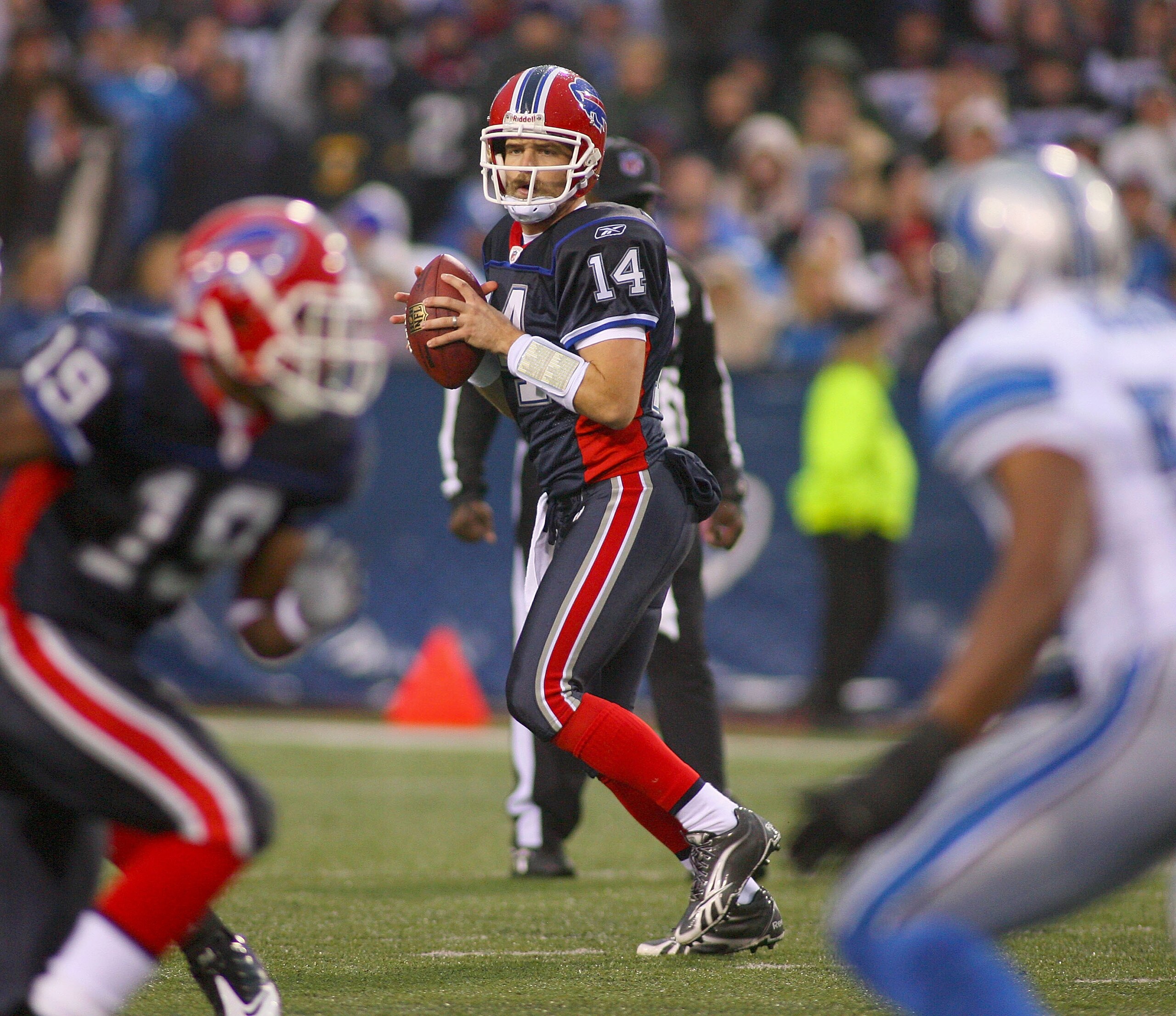 ORCHARD PARK, NY - NOVEMBER 14: Ryan Fitzpatrick #14 of the Buffalo Bills readies to throw against the Detroit Lions at Ralph Wilson Stadium on November 14, 2010 in Orchard Park, New York. Buffalo won 14-12. (Photo by Rick Stewart/Getty Images) ORCHARD PARK, NY - NOVEMBER 14: Ryan Fitzpatrick #14 of the Buffalo Bills readies to throw against the Detroit Lions at Ralph Wilson Stadium on November 14, 2010 in Orchard Park, New York. Buffalo won 14-12. (Photo by Rick Stewart/Getty Images)