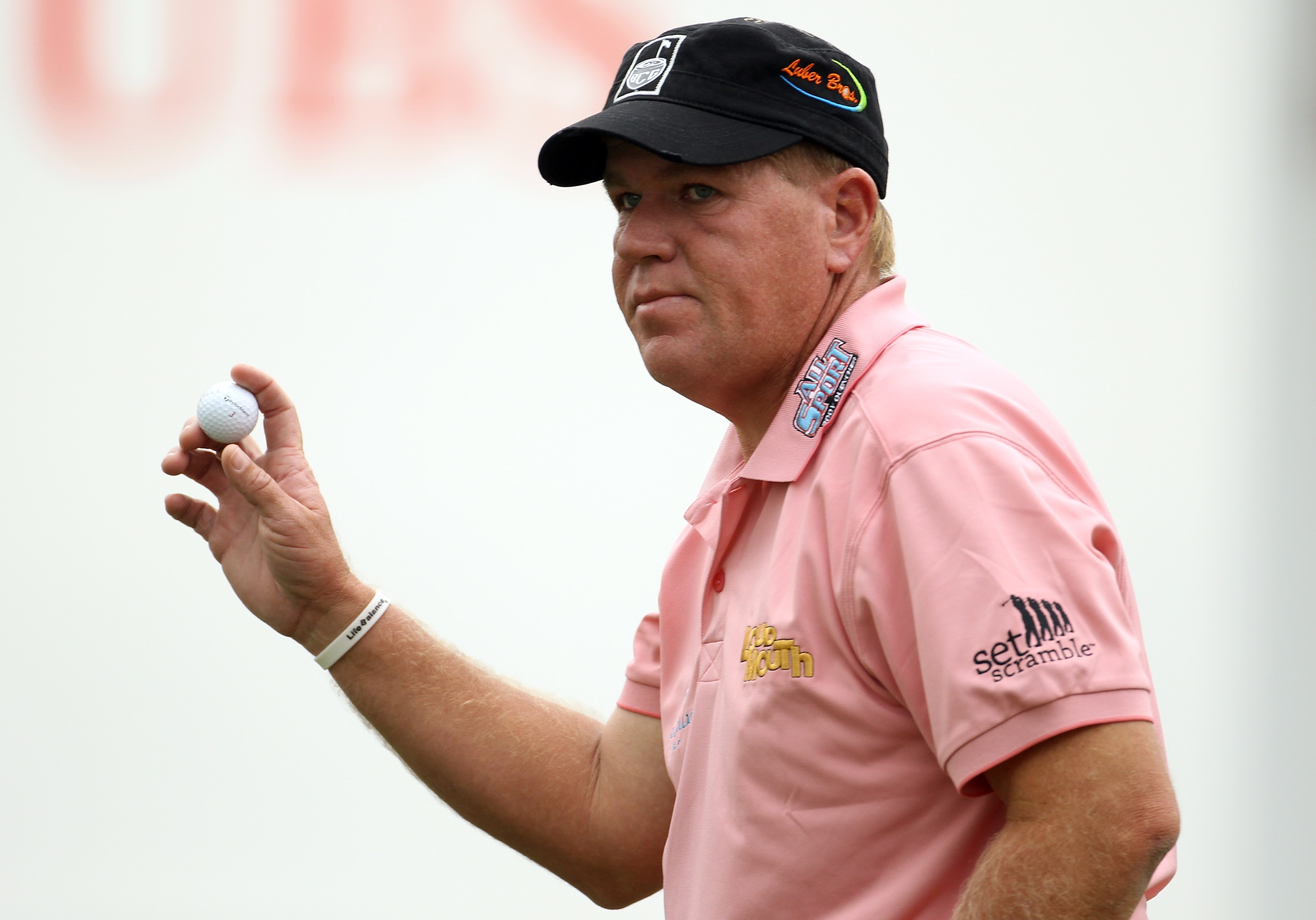 HONG KONG - NOVEMBER 18:  John Daly of the United States acknowledges the crowd during day one of the UBS Hong Kong Open at The Hong Kong Golf Club on November 18, 2010 in Hong Kong, Hong Kong.  (Photo by Ian Walton/Getty Images)