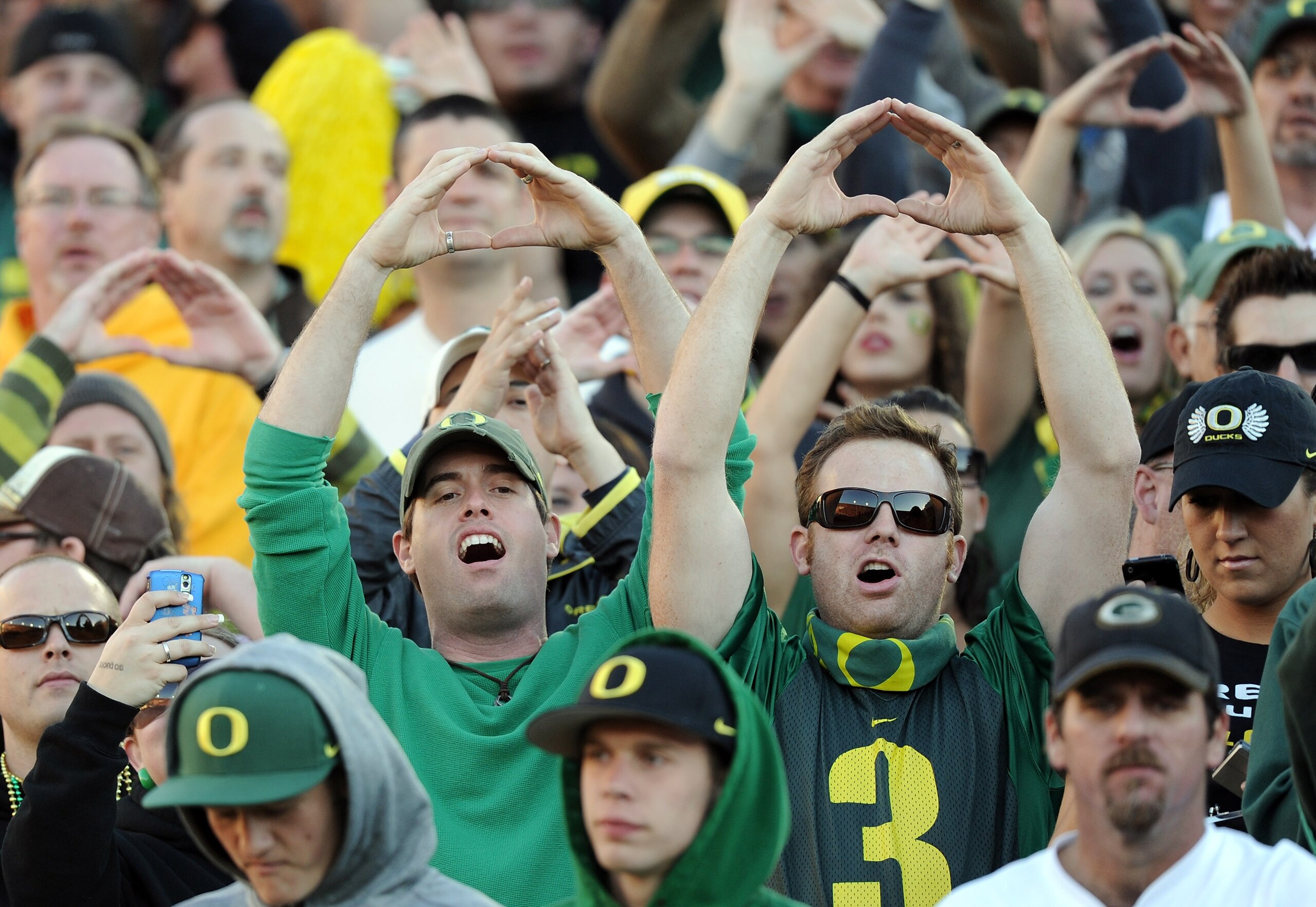 LOS ANGELES, CA - OCTOBER 30: Oregon Ducks fans during the game against the USC Trojans at Los Angeles Memorial Coliseum on October 30, 2010 in Los Angeles, California. (Photo by Harry How/Getty Images) LOS ANGELES, CA - OCTOBER 30: Oregon Ducks fans during the game against the USC Trojans at Los Angeles Memorial Coliseum on October 30, 2010 in Los Angeles, California. (Photo by Harry How/Getty Images)