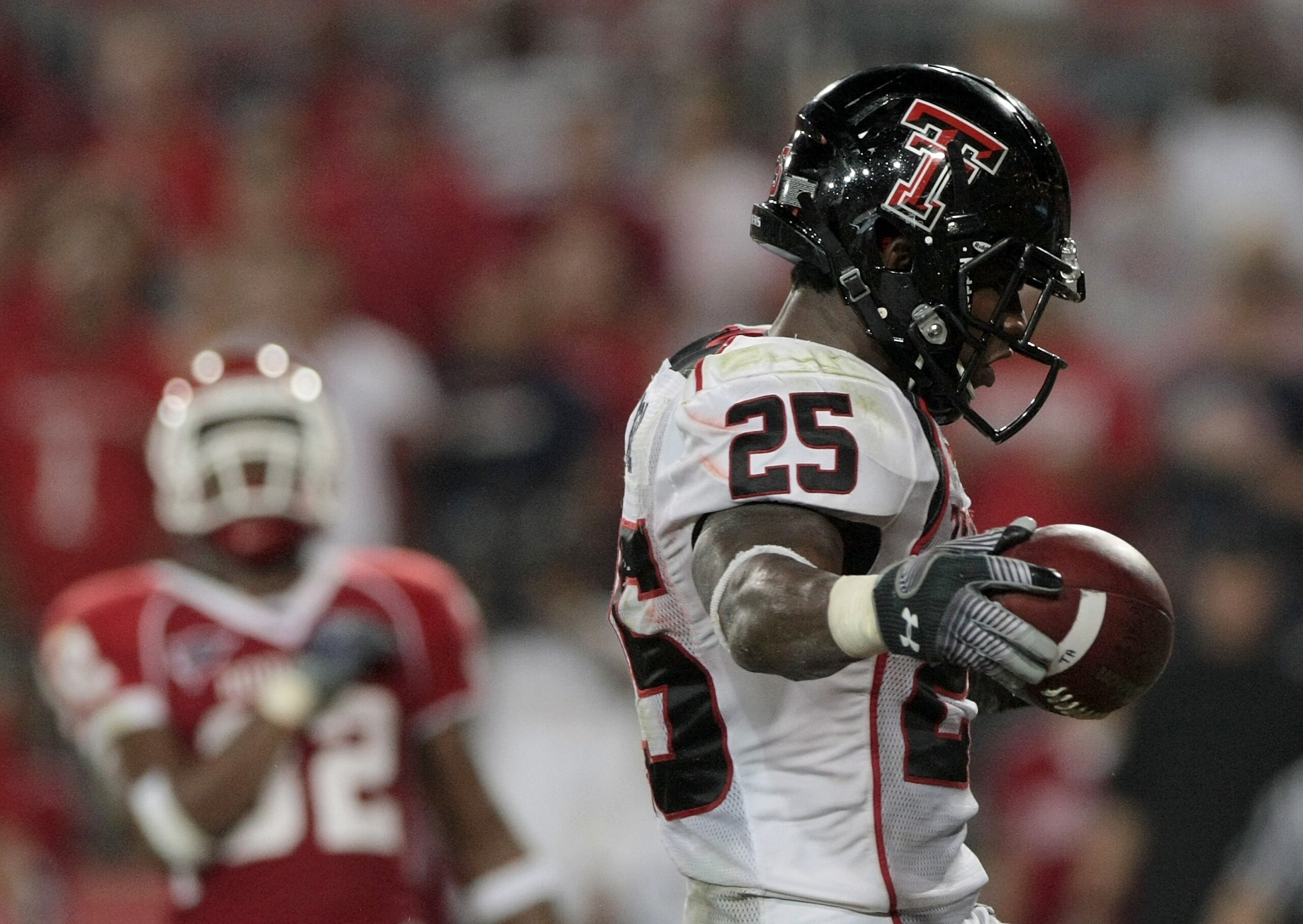 HOUSTON - SEPTEMBER 26:  Running back Baron Batch #25 of the Texas Tech Red Raiders scores a touchdown against the Houston Cougars at Robertson Stadium on September 26, 2009 in Houston, Texas.  (Photo by Thomas B. Shea/Getty Images)