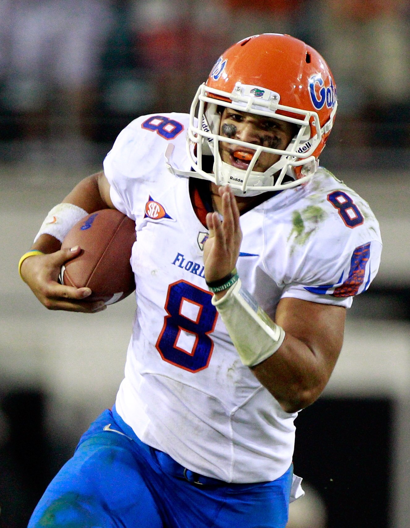 JACKSONVILLE, FL - OCTOBER 30:  Trey Burton #8 of the Florida Gators runs for yardage against the Georgia Bulldogs during the game at EverBank Field on October 30, 2010 in Jacksonville, Florida.  (Photo by Sam Greenwood/Getty Images)
