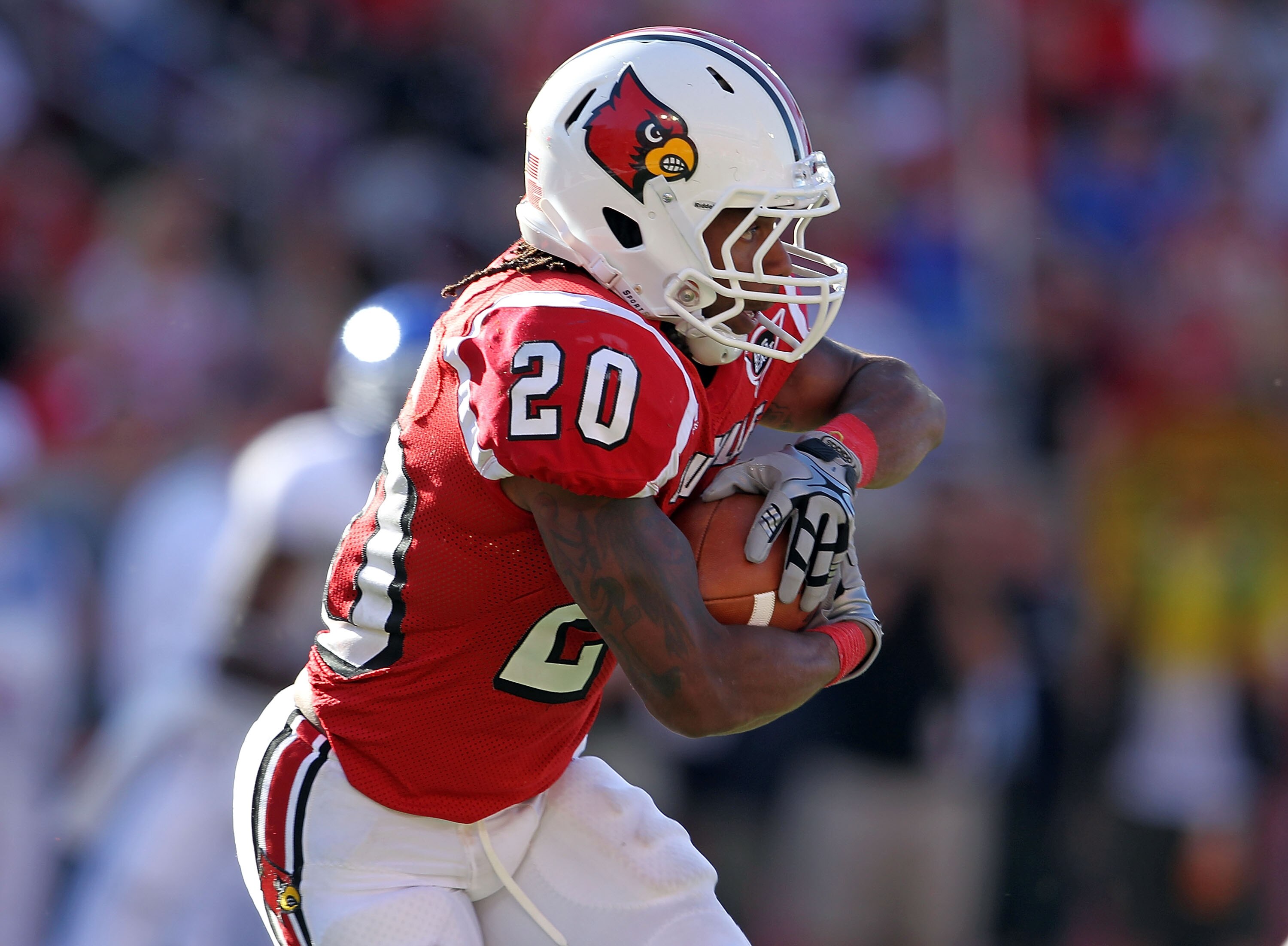 LOUISVILLE, KY - SEPTEMBER 04:  Victor Anderson #20 of the Louisville Cardinals runs with the ball during the game against the Kentucky Wildcats at Papa John's Cardinal Stadium on September 4, 2010 in Louisville, Kentucky.  (Photo by Andy Lyons/Getty Imag