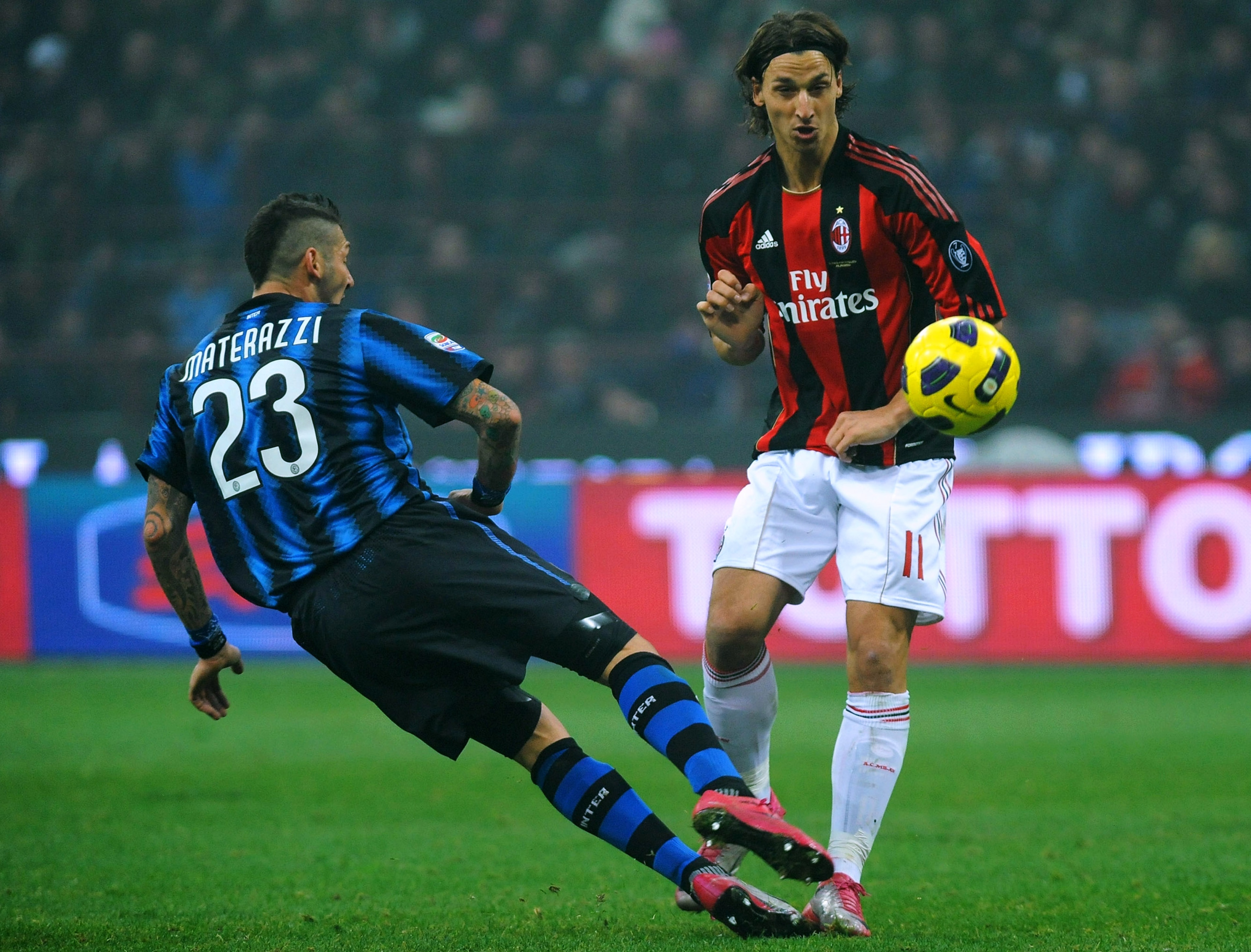 MILAN, ITALY - NOVEMBER 14: Marco Materazzi of FC Internazionale Milano clashes with Zlatan Ibrahimovic of AC Milan during the Serie A match between FC Internazionale Milano and AC Milan at Stadio Giuseppe Meazza on November 14, 2010 in Milan, Italy. (P MILAN, ITALY - NOVEMBER 14: Marco Materazzi of FC Internazionale Milano clashes with Zlatan Ibrahimovic of AC Milan during the Serie A match between FC Internazionale Milano and AC Milan at Stadio Giuseppe Meazza on November 14, 2010 in Milan, Italy. (P