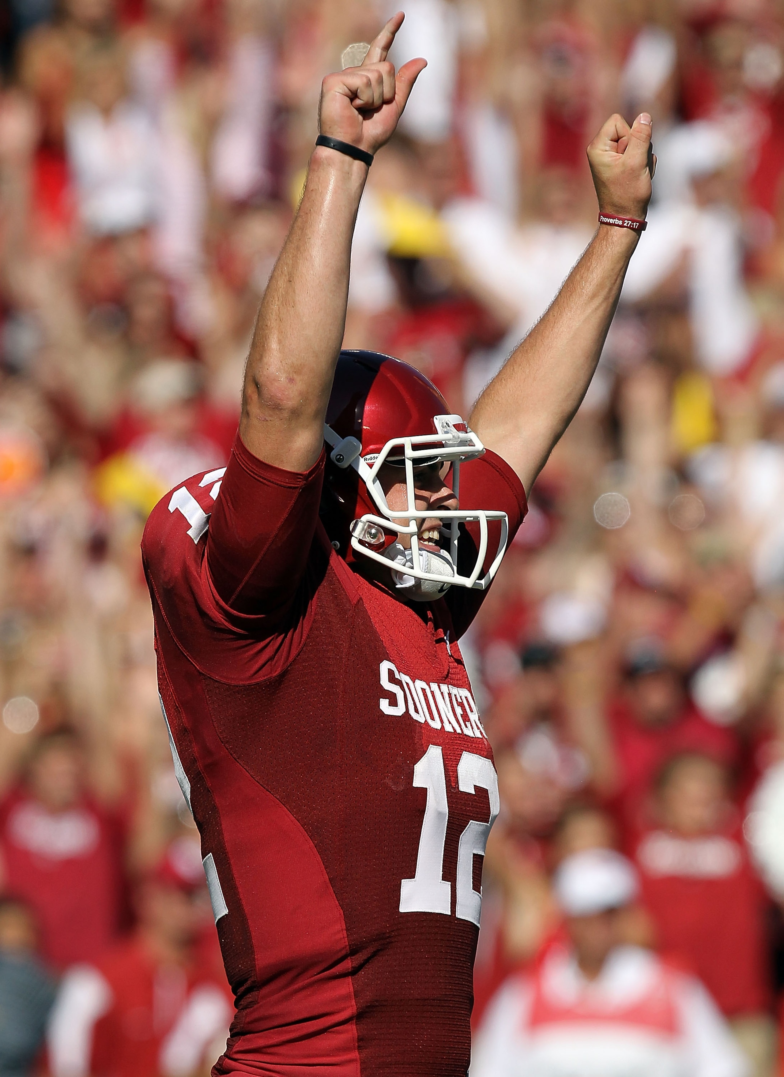DALLAS - OCTOBER 02: Quarterback Landry Jones #12 of the Oklahoma Sooners celebrates a touchdown against the Texas Longhorns in the second quarter at the Cotton Bowl on October 2, 2010 in Dallas, Texas. (Photo by Ronald Martinez/Getty Images) DALLAS - OCTOBER 02: Quarterback Landry Jones #12 of the Oklahoma Sooners celebrates a touchdown against the Texas Longhorns in the second quarter at the Cotton Bowl on October 2, 2010 in Dallas, Texas. (Photo by Ronald Martinez/Getty Images)
