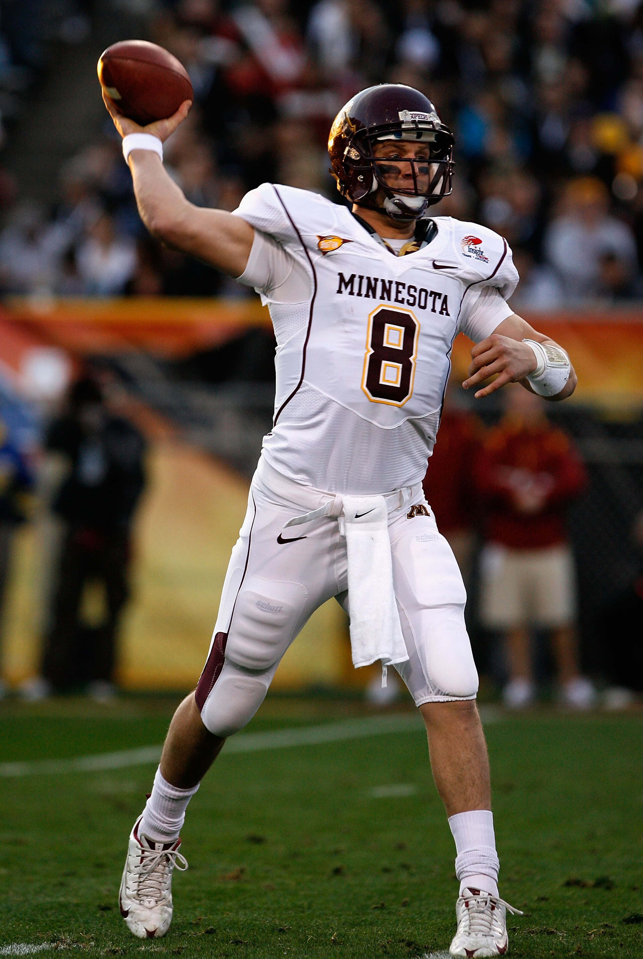 TEMPE, AZ - DECEMBER 31: Quarterback Adam Weber #8 of the Minnesota Golden Gophers throws a pass during the second quarter of the Insight Bowl against the Iowa State Cyclones at Arizona Stadium on December 31, 2009 in Tempe, Arizona. (Photo by Christian TEMPE, AZ - DECEMBER 31: Quarterback Adam Weber #8 of the Minnesota Golden Gophers throws a pass during the second quarter of the Insight Bowl against the Iowa State Cyclones at Arizona Stadium on December 31, 2009 in Tempe, Arizona. (Photo by Christian