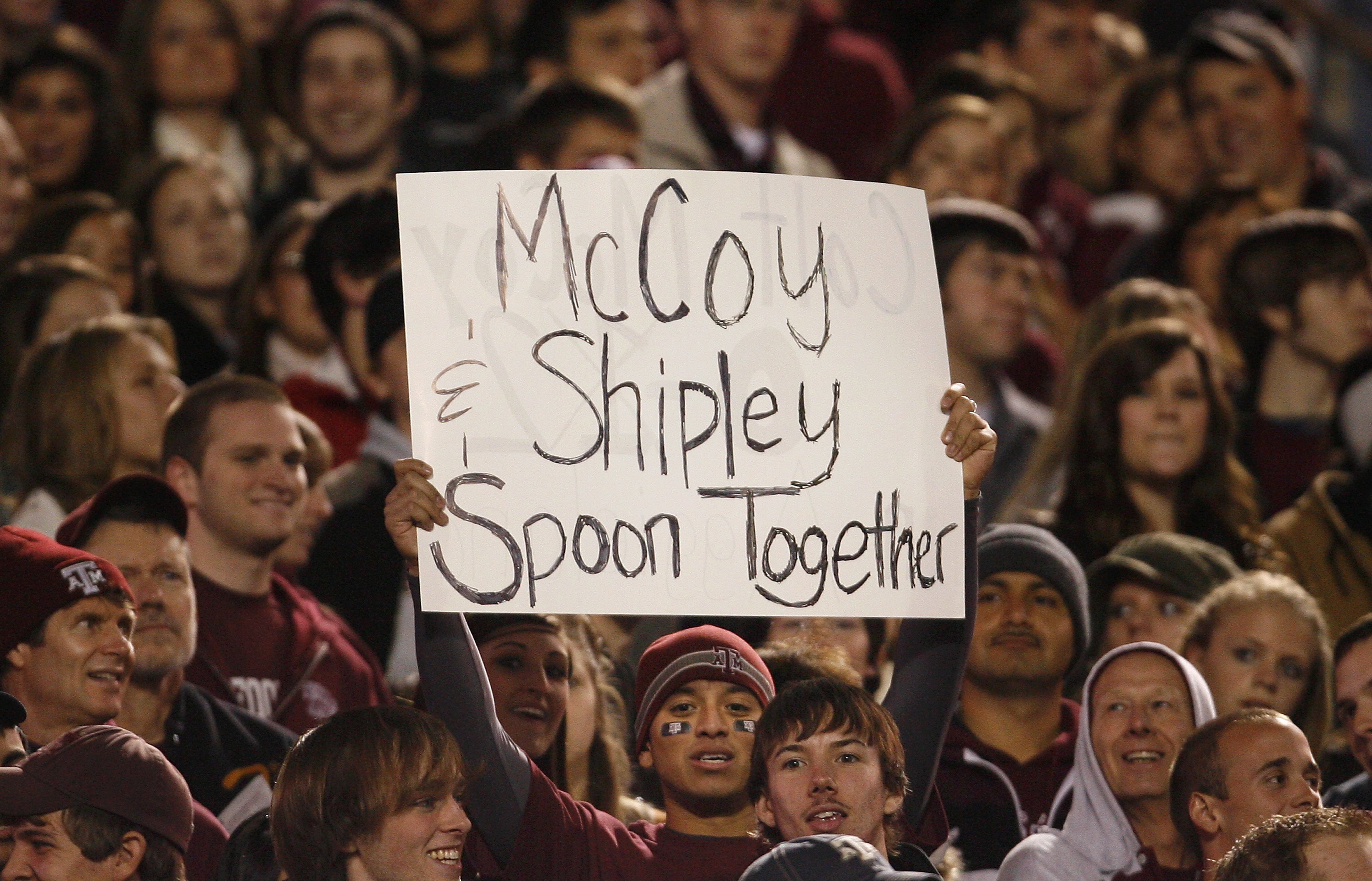 COLLEGE STATION, TX - NOVEMBER 26:  A Texas A&M Aggies fan holds up a sign in support of his team against the Texas Longhorns in the first half at Kyle Field on November 26, 2009 in College Station, Texas. The Longhorns defeated the Aggies 49-39. (Photo b