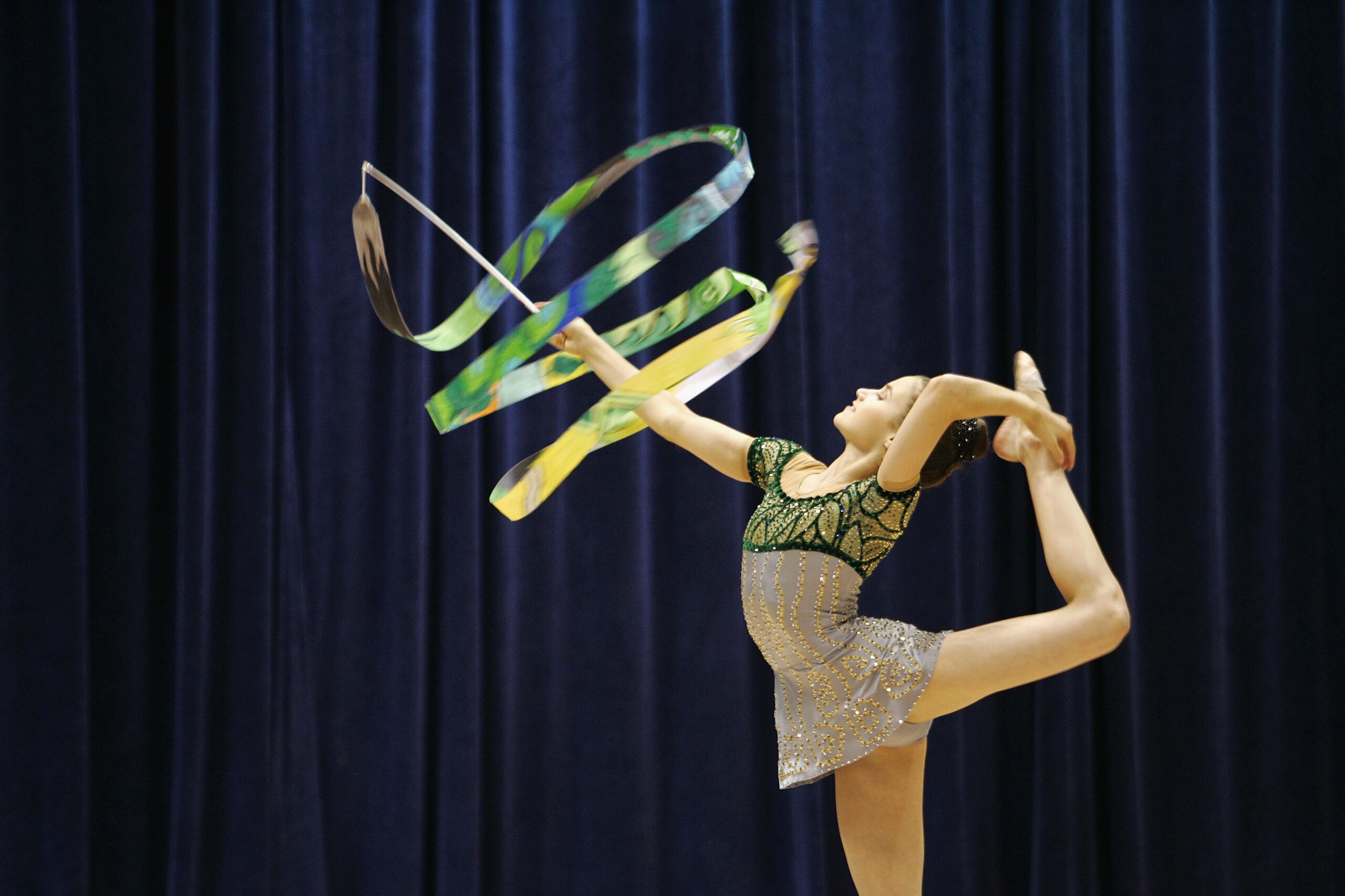 INDIANAPOLIS - AUGUST 11:  Emma Jay performs with ribbon during the 2005 Visa Championships Rhythmic All-Around Competition on August 11, 2005 at the Indianapolis Convention Center in Indianapolis, Indiana. (Photo by Brian Bahr/Getty Images)