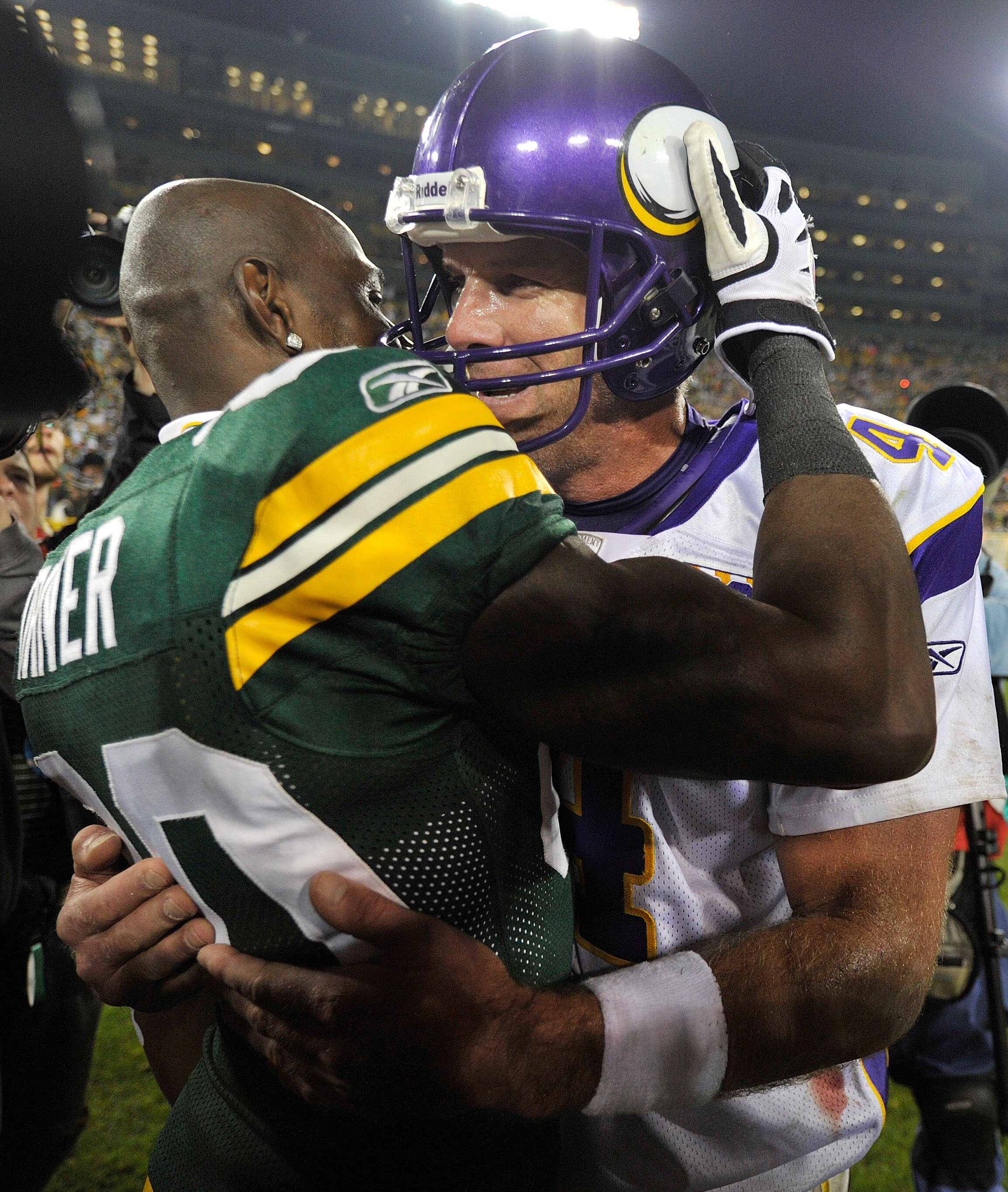 GREEN BAY, WI - OCTOBER 24:  Donald Driver #80 of the Green Bay Packers and  Brett Favre #4 of the Minnesota Vikings talk after the Packers defeated the Vikings 28-24 at Lambeau Field on October 24, 2010 in Green Bay, Wisconsin. (Photo by Jim Prisching/Ge
