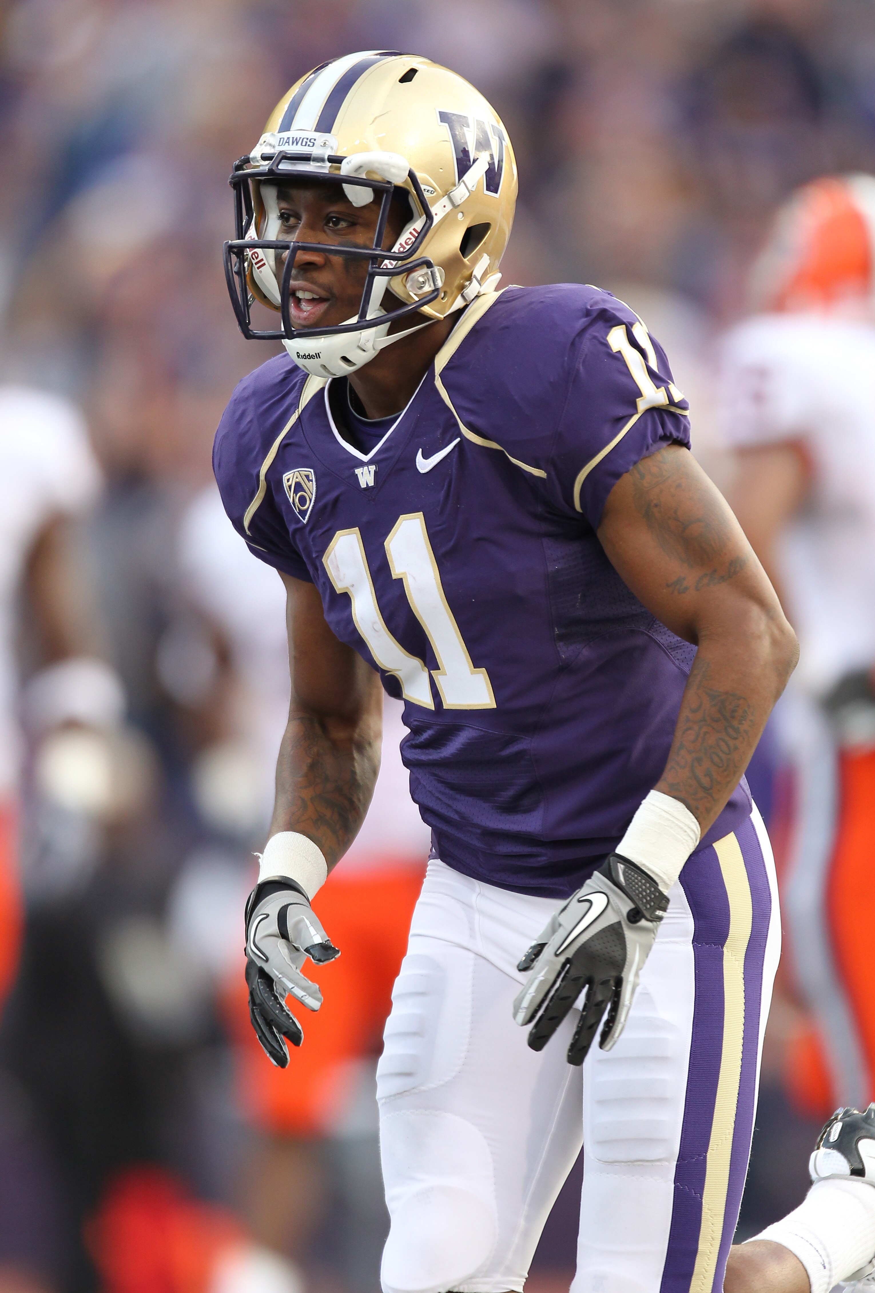 SEATTLE - SEPTEMBER 11:  D'Andre Goodwin #11 of the Washington Huskies smiles after Jermaine Kearse #15 scored a touchdown against the Syracuse Orange on September 11, 2010 at Husky Stadium in Seattle, Washington. (Photo by Otto Greule Jr/Getty Images)
