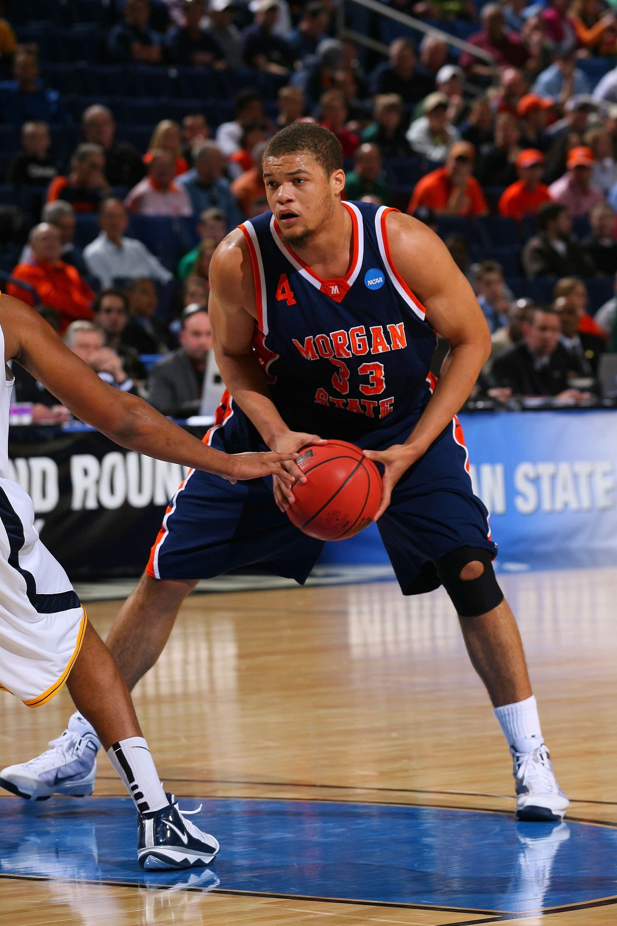 BUFFALO, NY - MARCH 19:  Kevin Thompson #33 of the Morgan State Bears handles the ball against the West Virginia Mountaineers during the first round of the 2010 NCAA men's basketball tournament at HSBC Arena on March 19, 2010 in Buffalo, New York.  (Photo