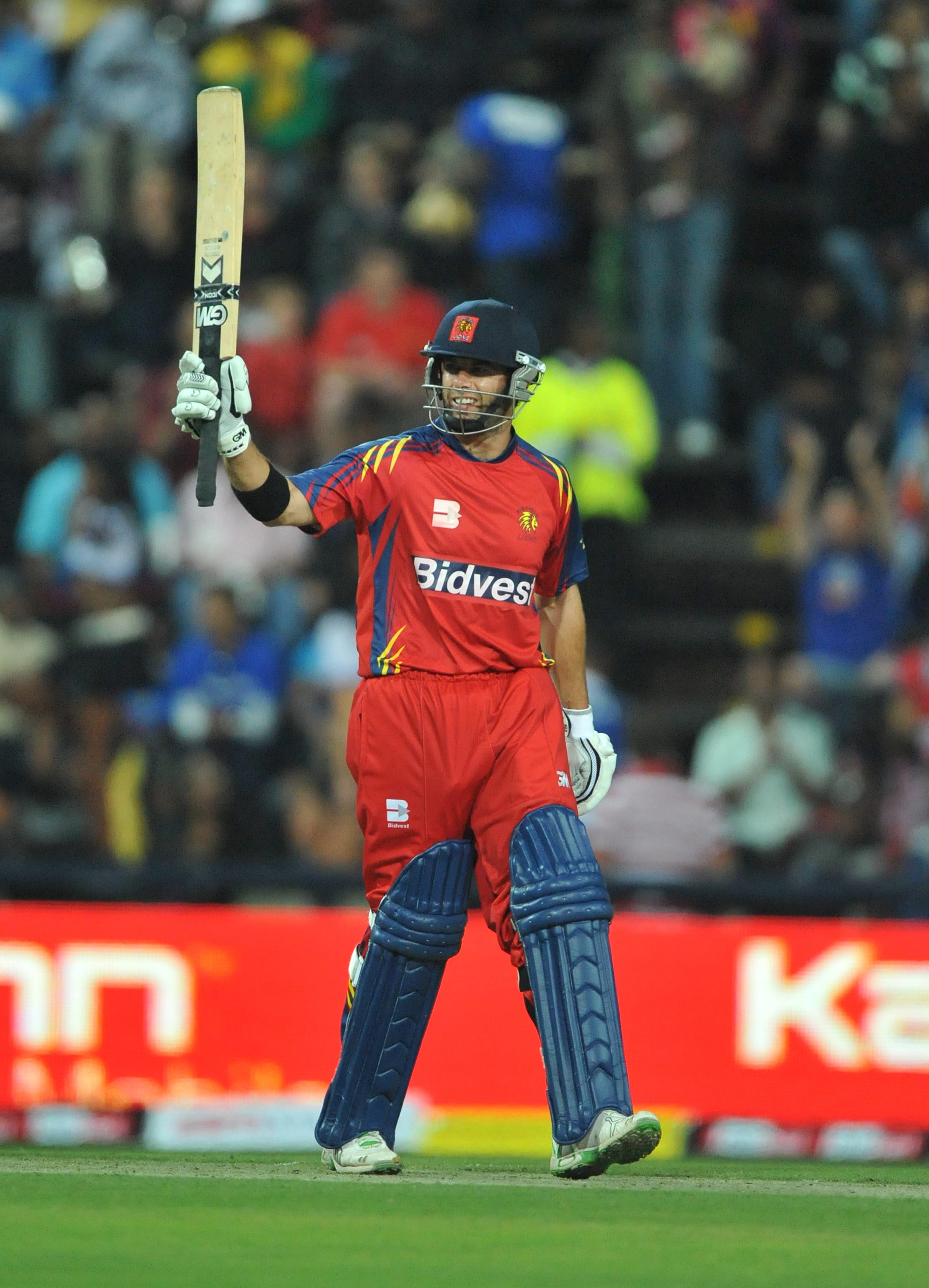 JOHANNESBURG, SOUTH AFRICA - SEPTEMBER 10:  Neil McKenzie of the Highveld Lions celebrates his 50 during the Airtel Champions League Twenty20 match between Mumbai Indians and Highveld Lions at Wanderers Stadium on September 10, 2010 in Johannesburg, South