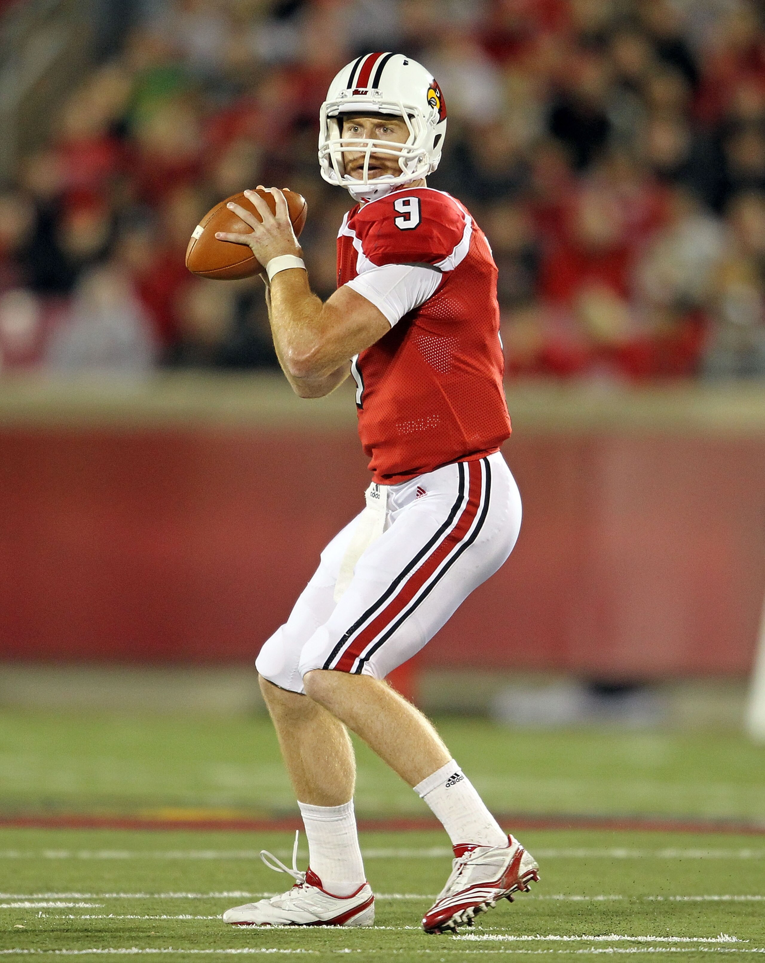 LOUISVILLE, KY - OCTOBER 15: Adam Froman #9 of the Louisville Cardinals throws a pass during the Big East Conference game against the Cincinnati Bearcats at Papa John's Cardinal Stadium on October 15, 2010 in Louisville, Kentucky. (Photo by Andy Lyons/G LOUISVILLE, KY - OCTOBER 15: Adam Froman #9 of the Louisville Cardinals throws a pass during the Big East Conference game against the Cincinnati Bearcats at Papa John's Cardinal Stadium on October 15, 2010 in Louisville, Kentucky. (Photo by Andy Lyons/G