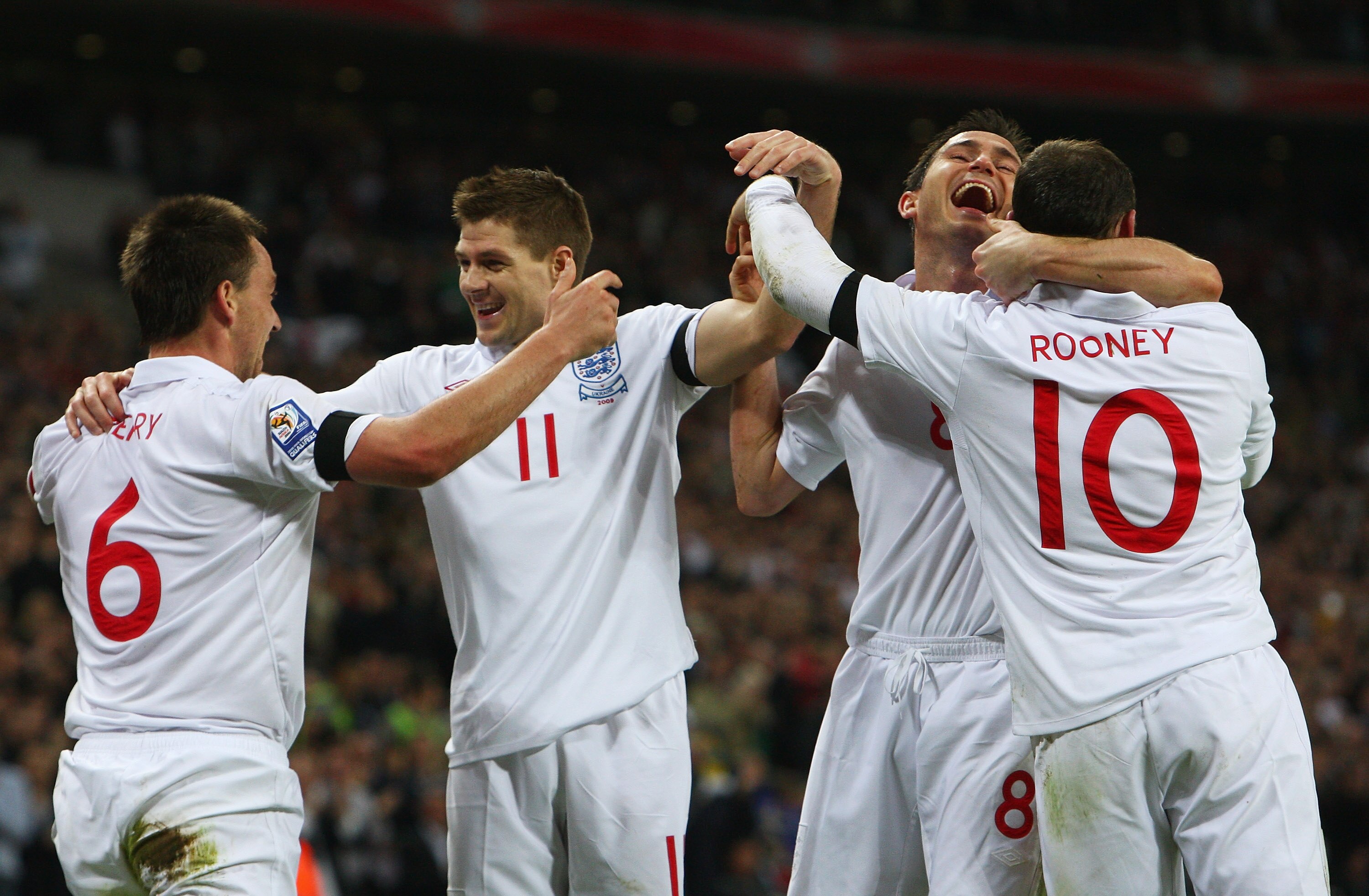 LONDON - APRIL 01:  John Terry (L) of England celebrates scoring his goal with Steven Gerrard, Frank Lampard and Wayne Rooney during the FIFA 2010 World Cup Group 6 Qualifying match between England and Ukraine at Wembley Stadium on April 1, 2009 in London
