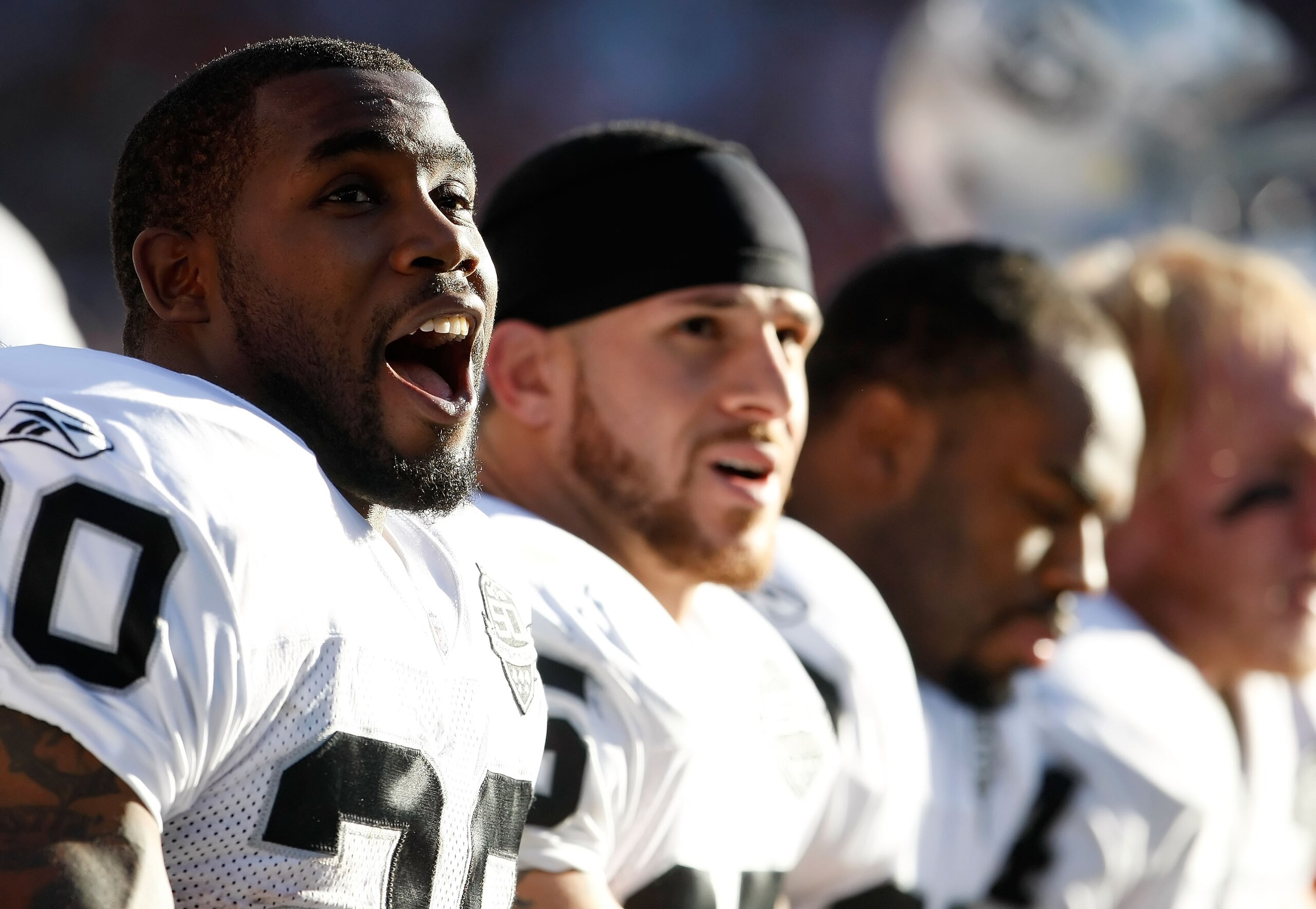 DENVER - DECEMBER 20: Darren McFadden #20 of the Oakland Raiders reacts on the bench during the first half against the Denver Broncos at Invesco Field at Mile High on December 20, 2009 in Denver, Colorado. The Raiders defeated the Broncos 20-19. (Photo DENVER - DECEMBER 20: Darren McFadden #20 of the Oakland Raiders reacts on the bench during the first half against the Denver Broncos at Invesco Field at Mile High on December 20, 2009 in Denver, Colorado. The Raiders defeated the Broncos 20-19. (Photo