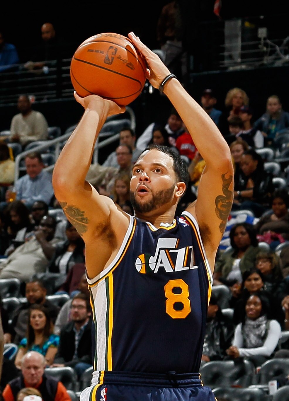 ATLANTA - NOVEMBER 12:  Deron Williams #8 of the Utah Jazz shoots against the Atlanta Hawks at Philips Arena on November 12, 2010 in Atlanta, Georgia.  NOTE TO USER: User expressly acknowledges and agrees that, by downloading and/or using this Photograph,