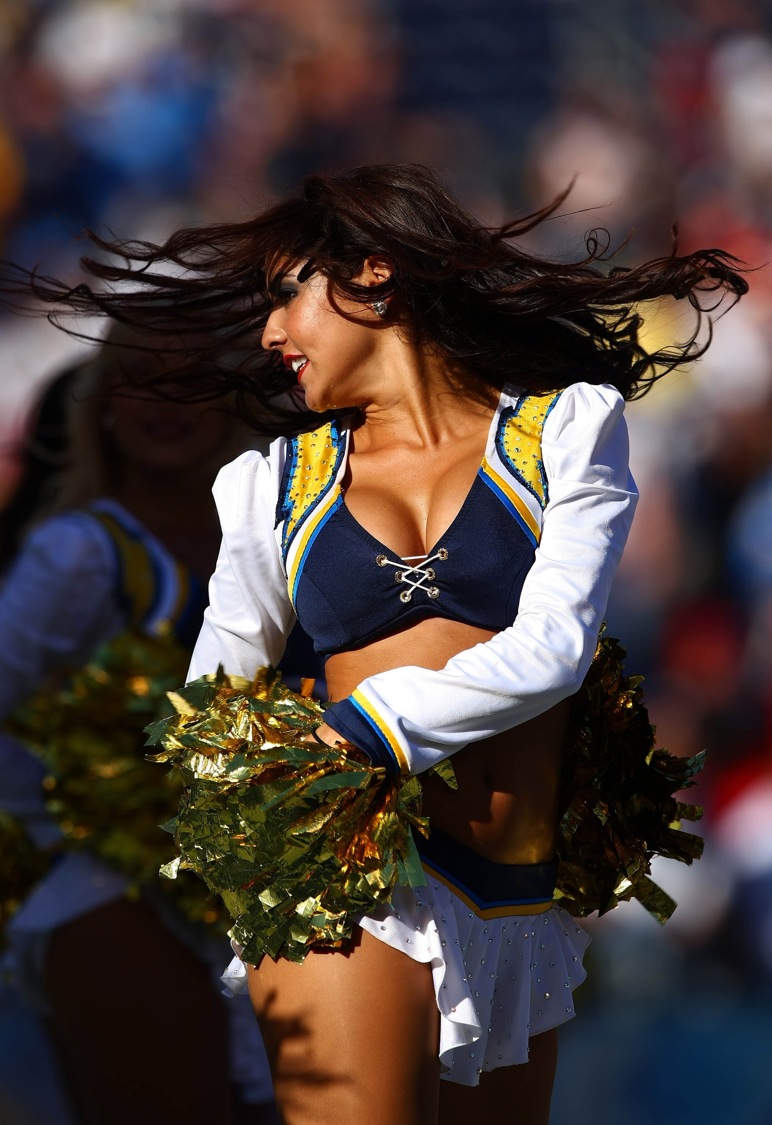 SAN DIEGO, UNITED STATES - SEPTEMBER 30: A Cheerleader from the San Diego Chargers performs a dance routine during their NFL game on September 30, 2007 at Qualcomm Stadium in San Diego, California.  (Photo by Donald Miralle/Getty Images)