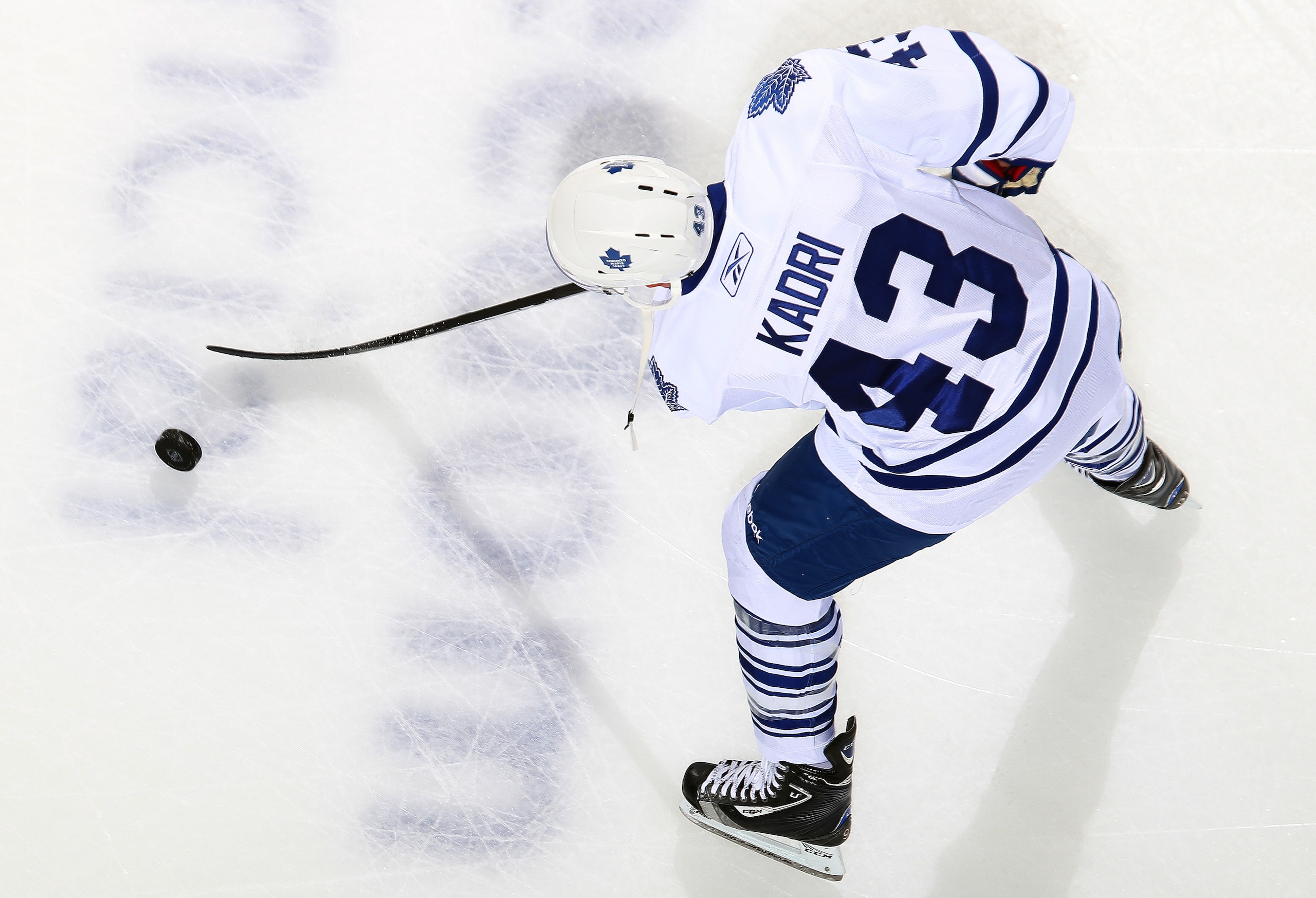 LONDON, CANADA - SEPTEMBER 11:  Nazem Kadri #43 of the Toronto Maple Leafs tries to control the puck in a game against the Chicago Blackhawks during the NHL Rookie Tournament on September 11,2010 at the John Labatt Centre in London, Ontario, Canada. The L