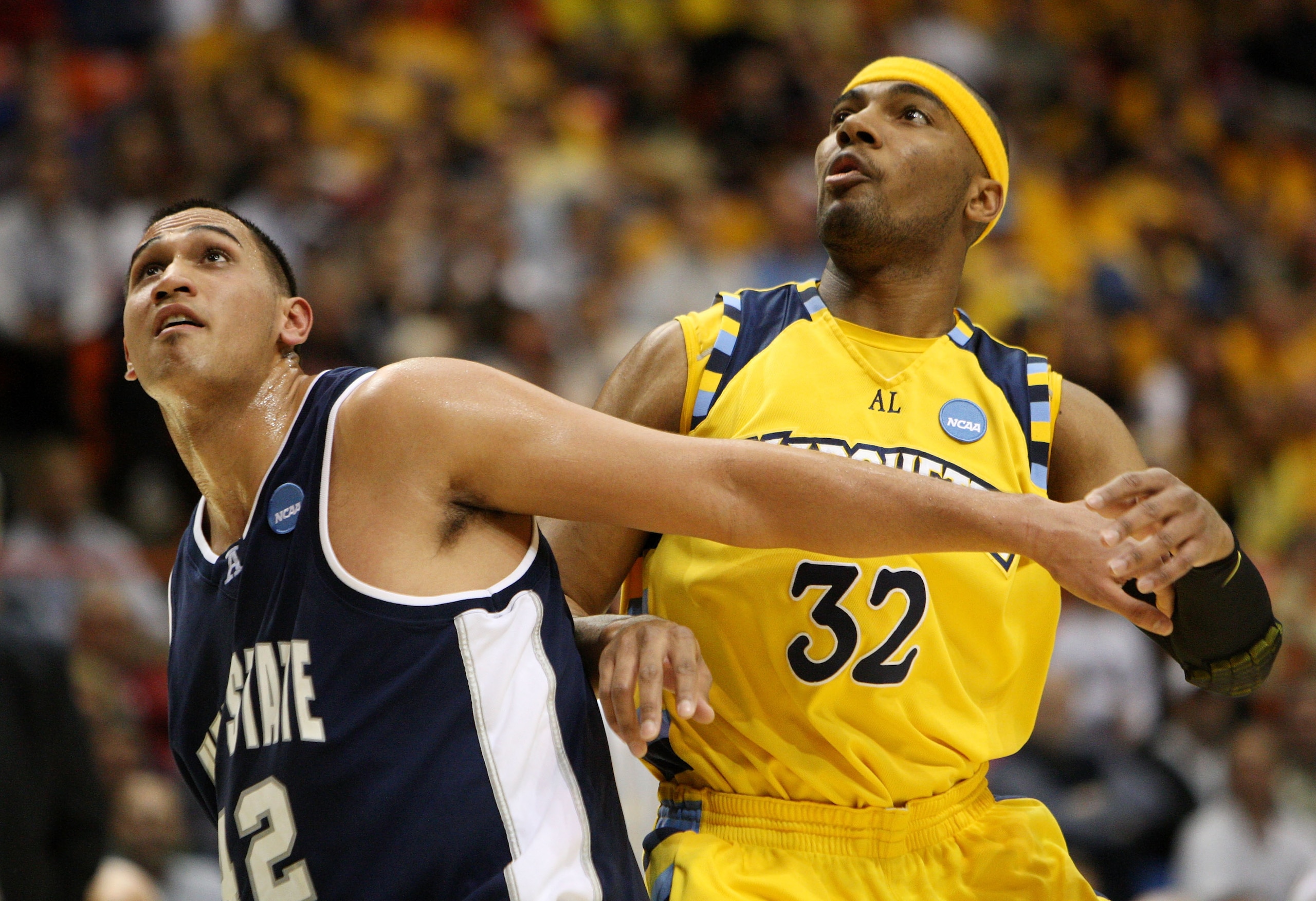 BOISE, ID - MARCH 20: Forward Lazar Hayward #32 of the Marquette Golden Eagles fights for position with forward Tai Wesley #42 of the Utah State Aggies in the first round of the NCAA Division I Men's Basketball Tournament at the Taco Bell Arena on March BOISE, ID - MARCH 20: Forward Lazar Hayward #32 of the Marquette Golden Eagles fights for position with forward Tai Wesley #42 of the Utah State Aggies in the first round of the NCAA Division I Men's Basketball Tournament at the Taco Bell Arena on March