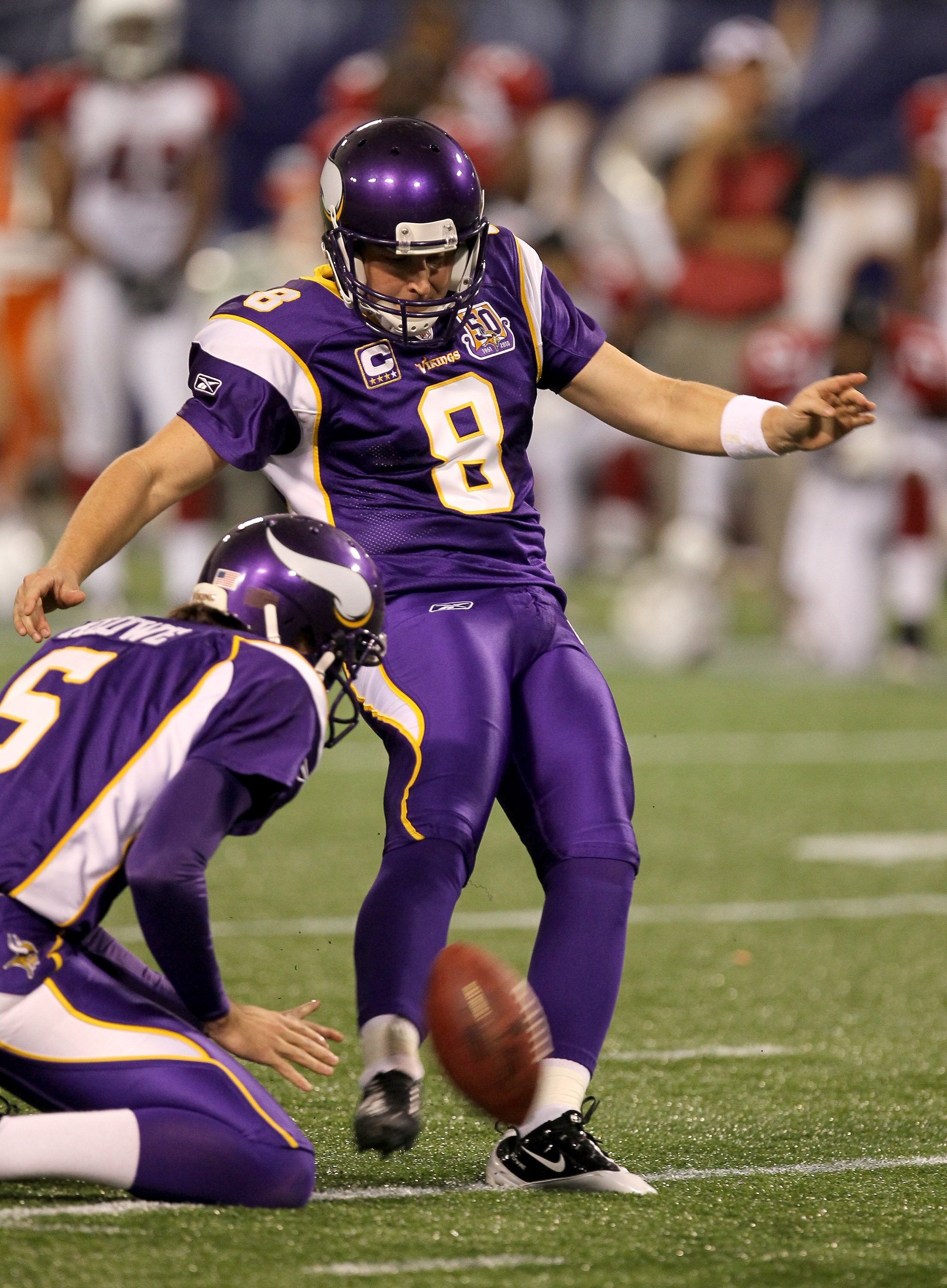 MINNEAPOLIS - NOVEMBER 07:  Kicker Ryan Longwell #8 kicks a game winnng 35 yard field goal in overtime against the Arizona Cardinals at Hubert H. Humphrey Metrodome on November 7, 2010 in Minneapolis, Minnesota.  The Vikings won 27-24 in overtime.  (Photo